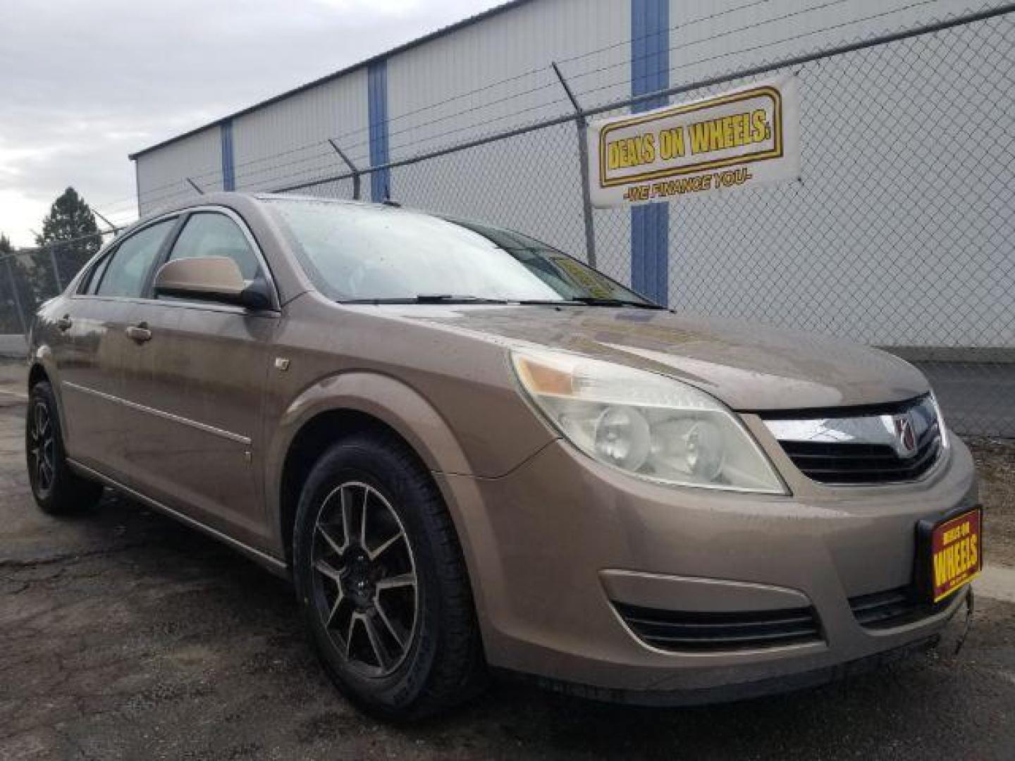 2007 Saturn Aura XE (1G8ZS57N37F) with an 3.5L V6 12V OHV engine, 4-Speed Automatic transmission, located at 601 E. Idaho St., Kalispell, MT, 59901, 48.203983, -114.308662 - Photo#2