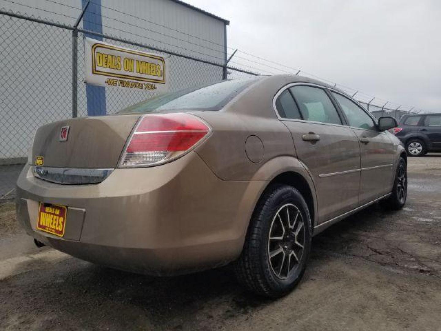 2007 Saturn Aura XE (1G8ZS57N37F) with an 3.5L V6 12V OHV engine, 4-Speed Automatic transmission, located at 601 E. Idaho St., Kalispell, MT, 59901, 48.203983, -114.308662 - Photo#4