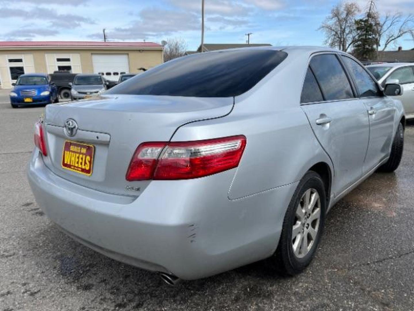 2007 Toyota Camry XLE V6 (4T1BK46K27U) with an 3.5L V6 DOHC 24V engine, 6-Speed Automatic transmission, located at 1821 N Montana Ave., Helena, MT, 59601, 46.603447, -112.022781 - Photo#2