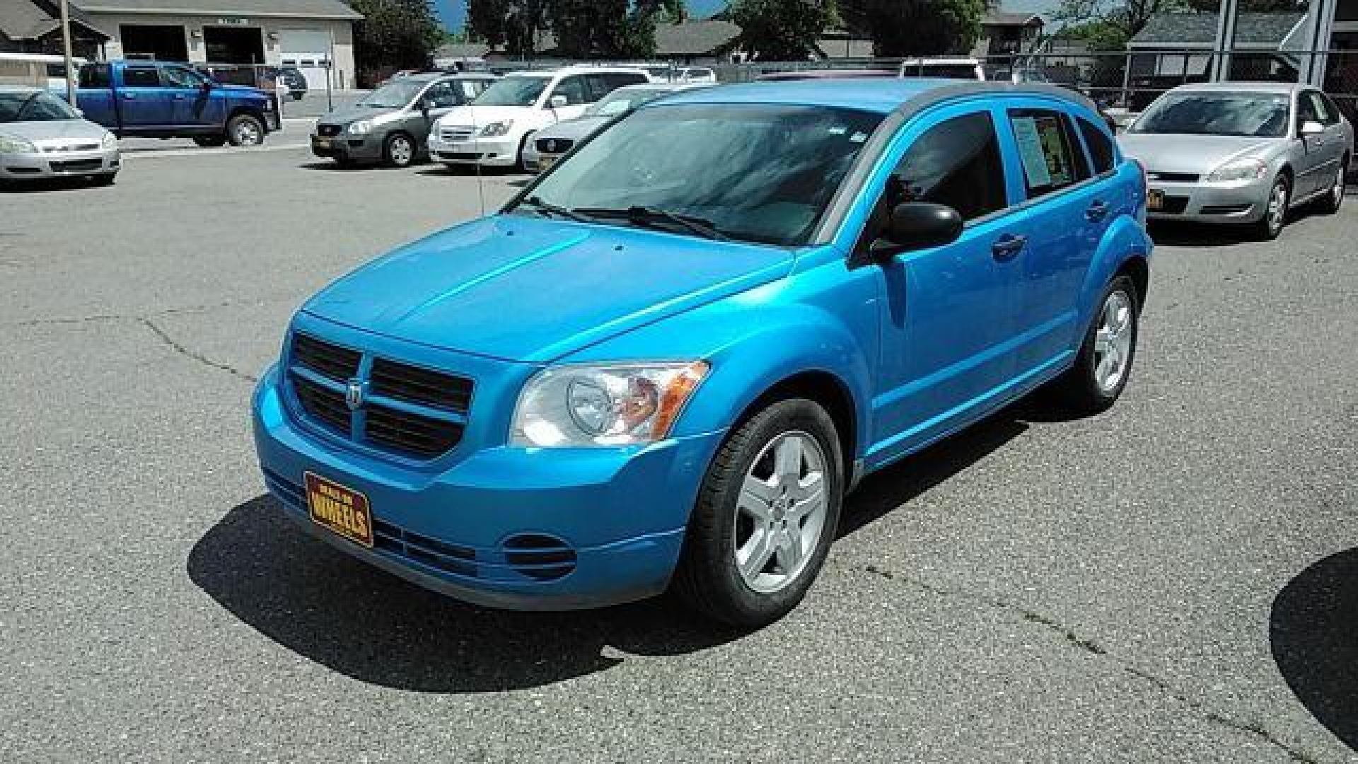 2008 Steel Blue Metallic /Dark Slate Gray Clot Dodge Caliber SE (1B3HB28C08D) with an 1.8L L4 DOHC 16V engine, located at 4047 Montana Ave., Billings, MT, 59101, 45.770847, -108.529800 - Looking for a reliable and affordable pre-owned vehicle in Billings, MT? Look no further than this 2008 Dodge Caliber SE, available at DOW - Billings. With a price tag of just $12,995, this car offers great value for money. The exterior of this Dodge Caliber is finished in a stylish Steel Blue Met - Photo#0