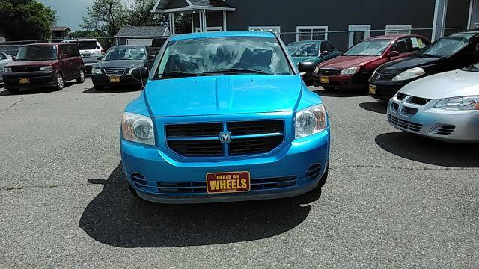 2008 Steel Blue Metallic /Dark Slate Gray Clot Dodge Caliber SE (1B3HB28C08D) with an 1.8L L4 DOHC 16V engine, located at 4047 Montana Ave., Billings, MT, 59101, 45.770847, -108.529800 - Looking for a reliable and affordable pre-owned vehicle in Billings, MT? Look no further than this 2008 Dodge Caliber SE, available at DOW - Billings. With a price tag of just $12,995, this car offers great value for money. The exterior of this Dodge Caliber is finished in a stylish Steel Blue Met - Photo#1