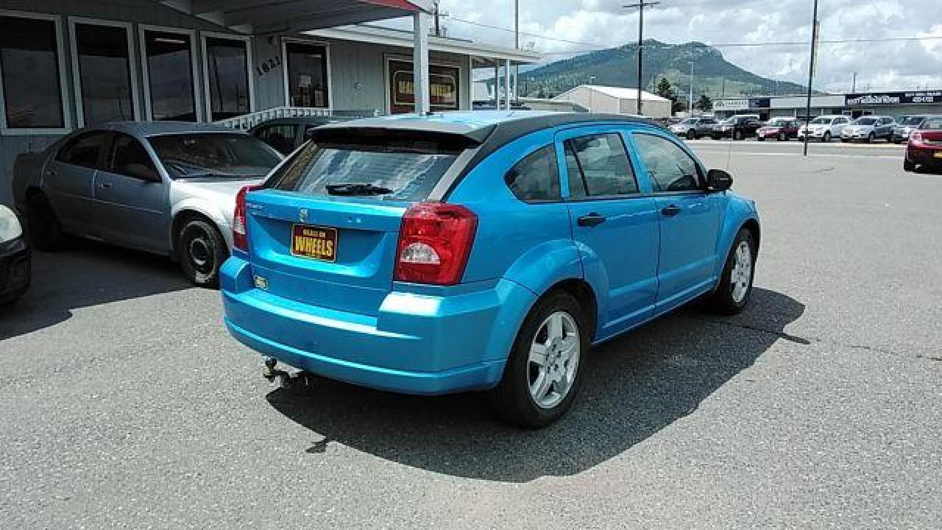 2008 Steel Blue Metallic /Dark Slate Gray Clot Dodge Caliber SE (1B3HB28C08D) with an 1.8L L4 DOHC 16V engine, located at 4047 Montana Ave., Billings, MT, 59101, 45.770847, -108.529800 - Looking for a reliable and affordable pre-owned vehicle in Billings, MT? Look no further than this 2008 Dodge Caliber SE, available at DOW - Billings. With a price tag of just $12,995, this car offers great value for money. The exterior of this Dodge Caliber is finished in a stylish Steel Blue Met - Photo#4