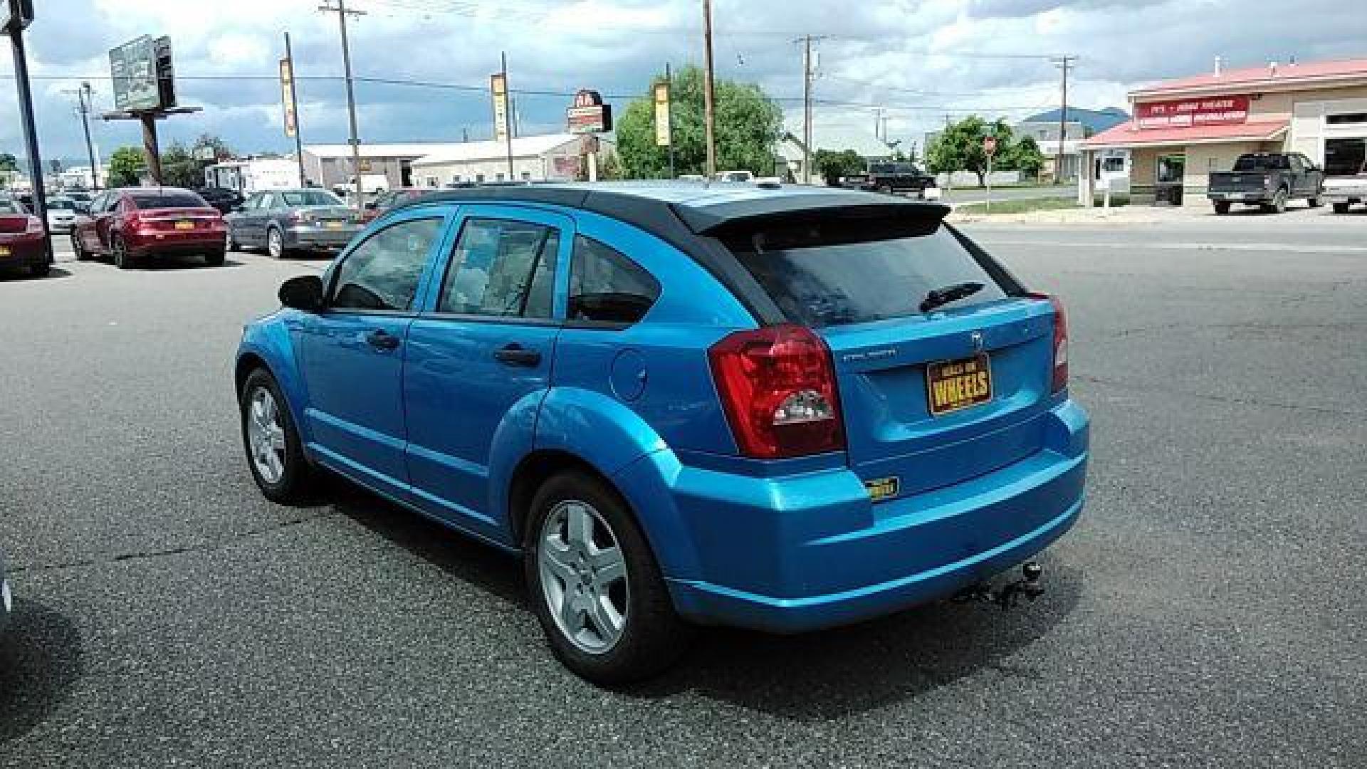 2008 Steel Blue Metallic /Dark Slate Gray Clot Dodge Caliber SE (1B3HB28C08D) with an 1.8L L4 DOHC 16V engine, located at 4047 Montana Ave., Billings, MT, 59101, 45.770847, -108.529800 - Looking for a reliable and affordable pre-owned vehicle in Billings, MT? Look no further than this 2008 Dodge Caliber SE, available at DOW - Billings. With a price tag of just $12,995, this car offers great value for money. The exterior of this Dodge Caliber is finished in a stylish Steel Blue Met - Photo#6