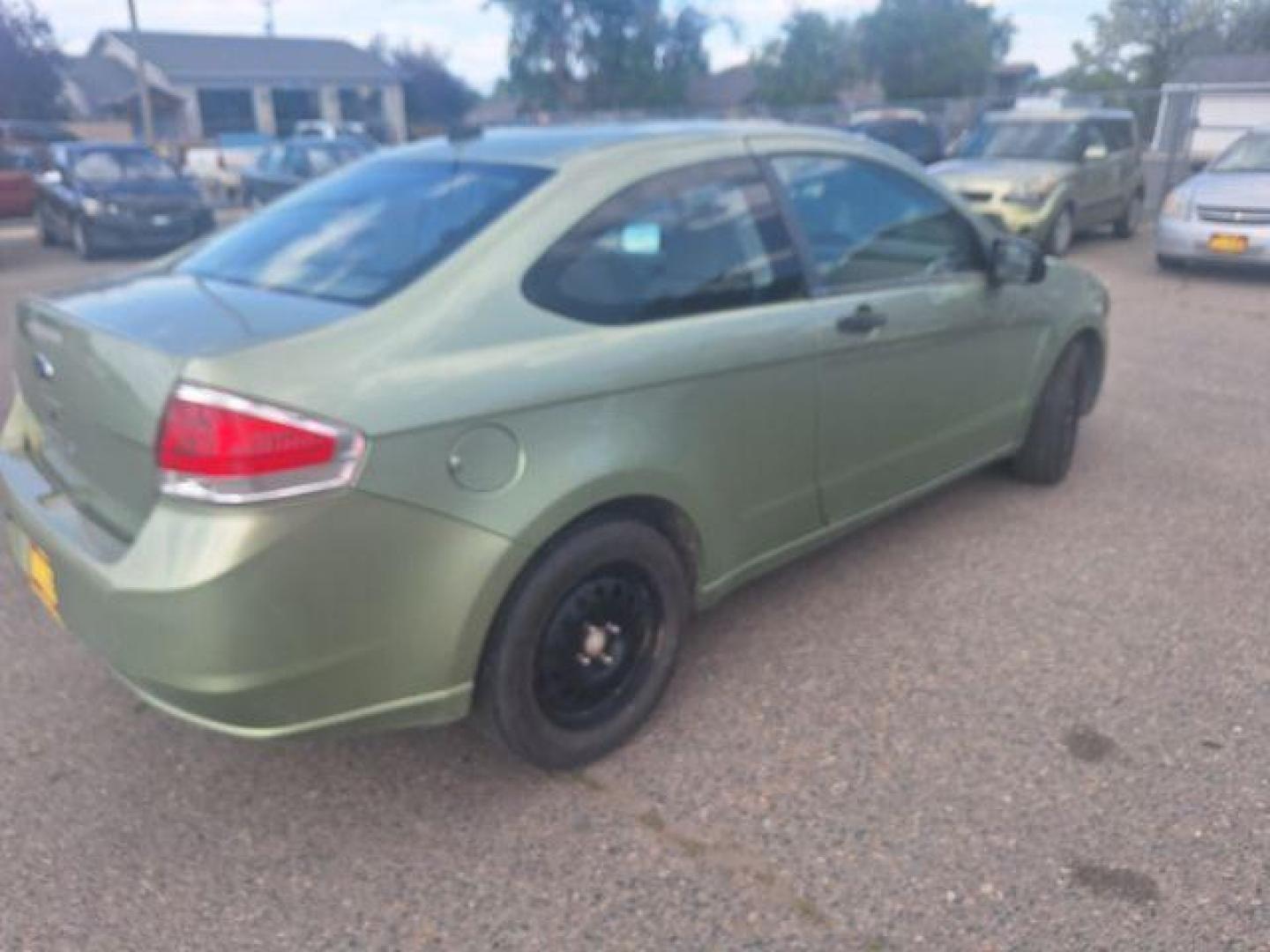 2008 GREEN FORD FOCUS green (1FAHP32N58W) with an 2.0L 16V engine, Manual transmission, located at 1821 N Montana Ave., Helena, MT, 59601, 46.603447, -112.022781 - Photo#2