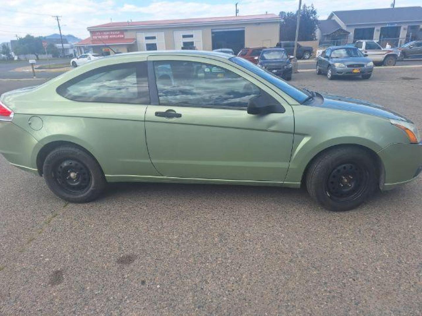 2008 GREEN FORD FOCUS green (1FAHP32N58W) with an 2.0L 16V engine, Manual transmission, located at 1821 N Montana Ave., Helena, MT, 59601, 46.603447, -112.022781 - Photo#3