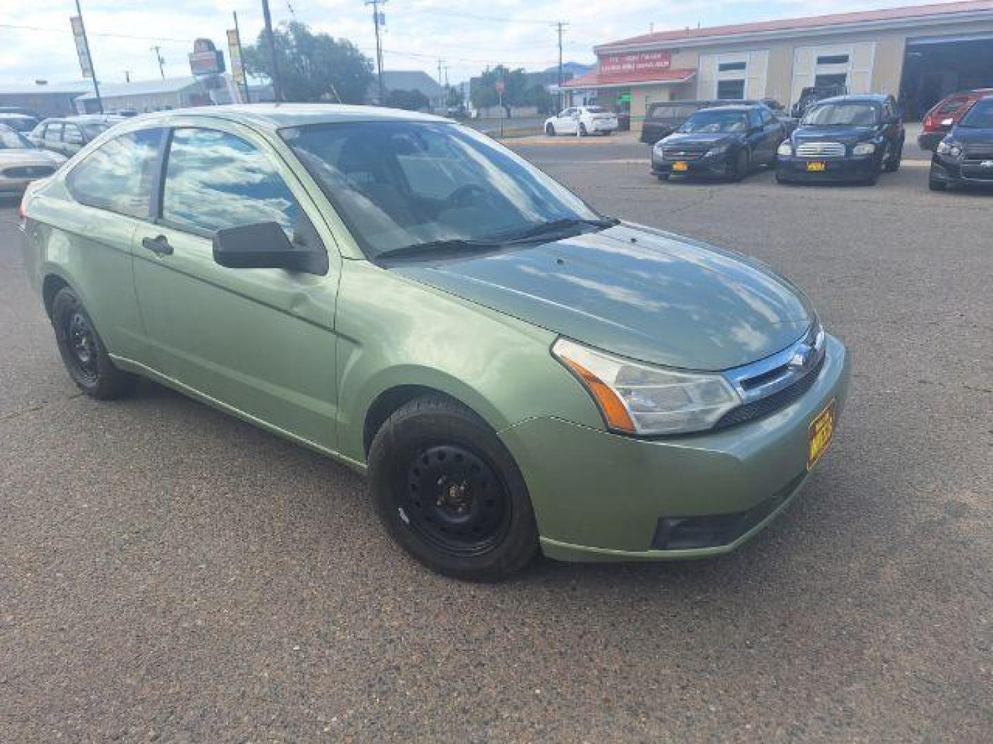 2008 GREEN FORD FOCUS green (1FAHP32N58W) with an 2.0L 16V engine, Manual transmission, located at 1821 N Montana Ave., Helena, MT, 59601, 46.603447, -112.022781 - Photo#4