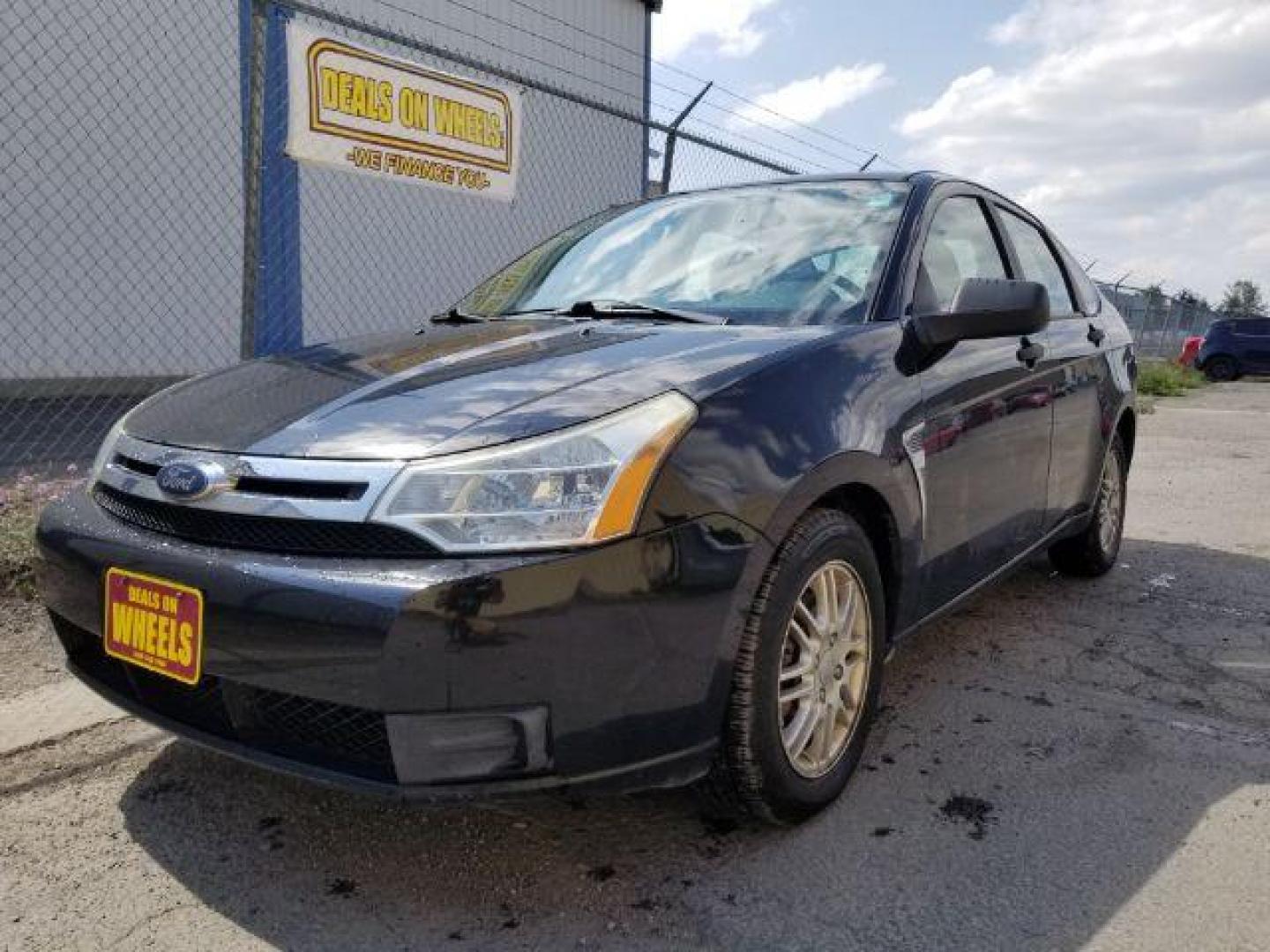 2008 Ford Focus SE Sedan (1FAHP35N28W) with an 2.0L L4 DOHC 16V engine, located at 1800 West Broadway, Missoula, 59808, (406) 543-1986, 46.881348, -114.023628 - Photo#0