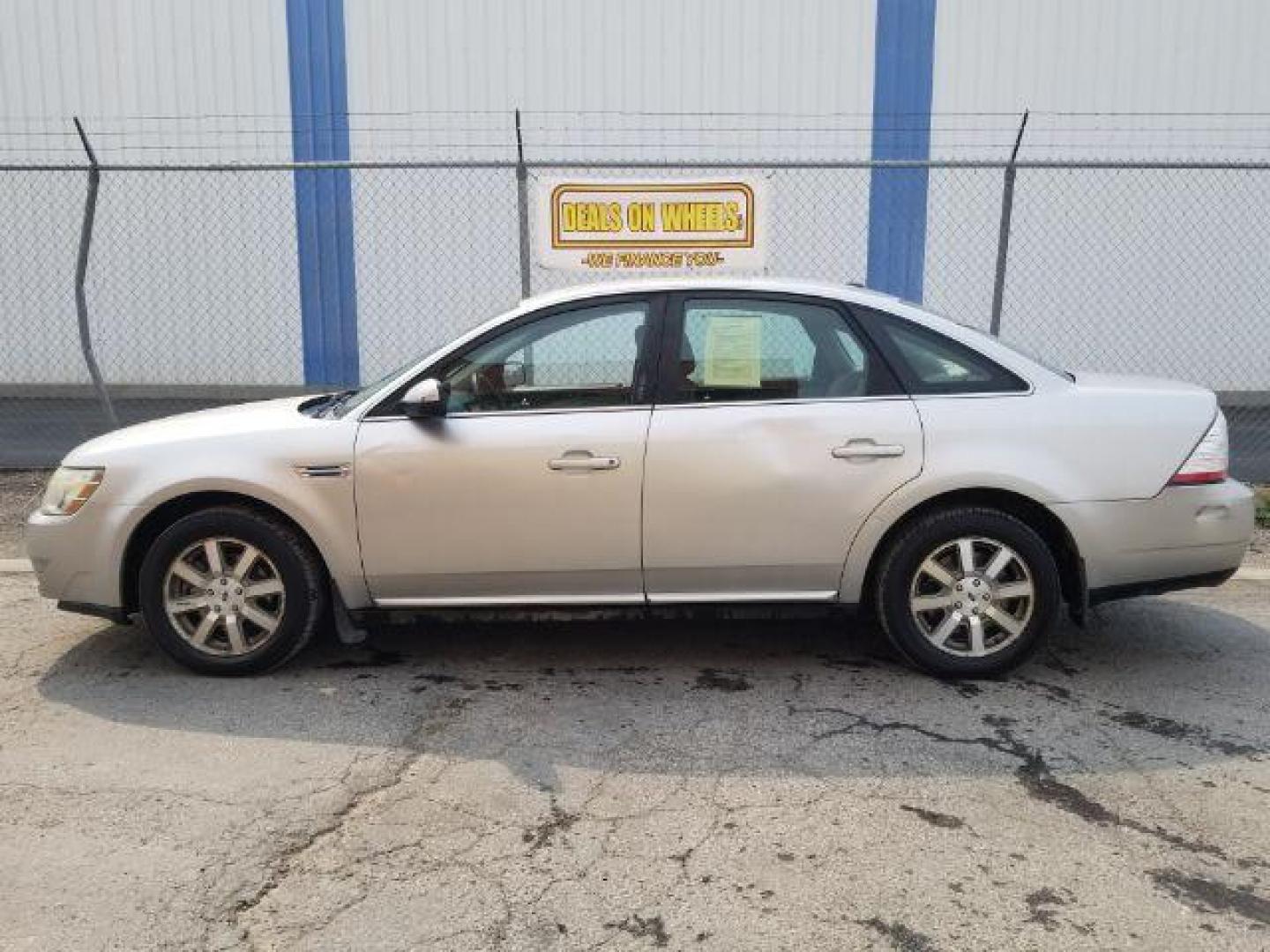 2008 Silver Birch Metalli Ford Taurus SEL (1FAHP24W08G) with an 3.5L V6 DOHC 24V engine, 6-Speed Automatic transmission, located at 4801 10th Ave S,, Great Falls, MT, 59405, 47.494347, -111.229942 - Photo#2