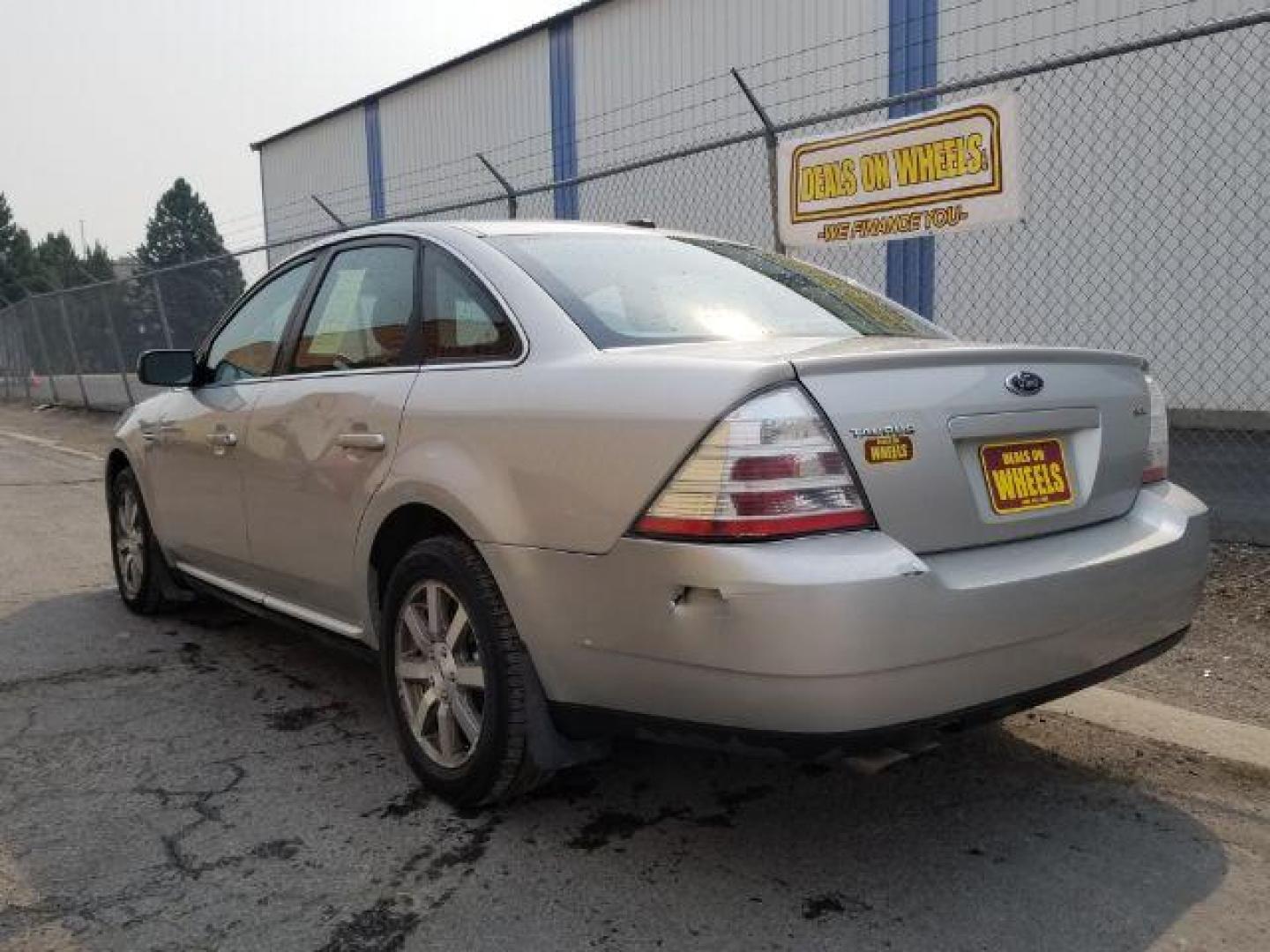 2008 Silver Birch Metalli Ford Taurus SEL (1FAHP24W08G) with an 3.5L V6 DOHC 24V engine, 6-Speed Automatic transmission, located at 4801 10th Ave S,, Great Falls, MT, 59405, 47.494347, -111.229942 - Photo#3