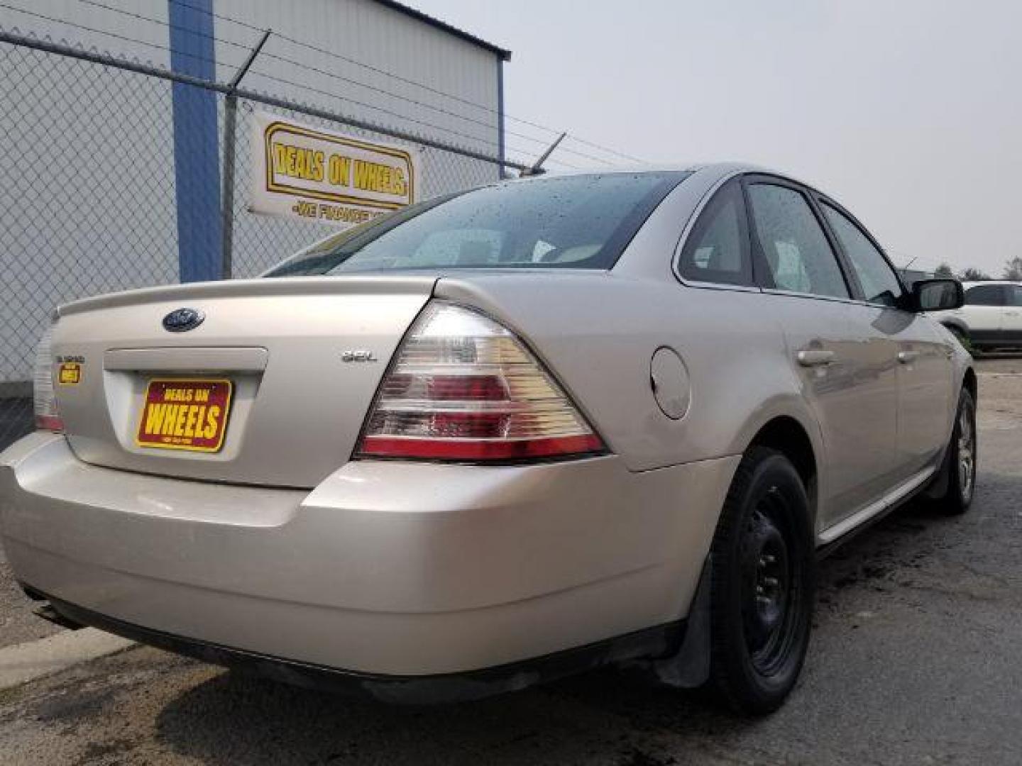 2008 Silver Birch Metalli Ford Taurus SEL (1FAHP24W08G) with an 3.5L V6 DOHC 24V engine, 6-Speed Automatic transmission, located at 4801 10th Ave S,, Great Falls, MT, 59405, 47.494347, -111.229942 - Photo#4