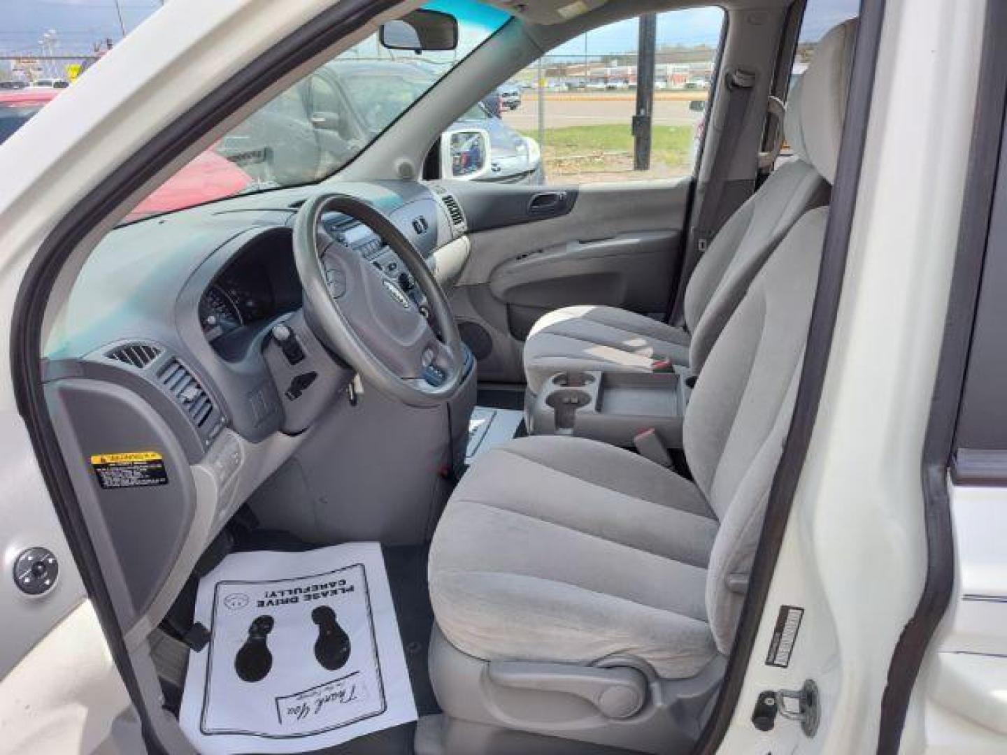 2008 Clear White Kia Sedona LX LWB (KNDMB233686) with an 3.8L V6 DOHC 24V engine, 5-Speed Automatic transmission, located at 4801 10th Ave S,, Great Falls, MT, 59405, 47.494347, -111.229942 - Photo#8