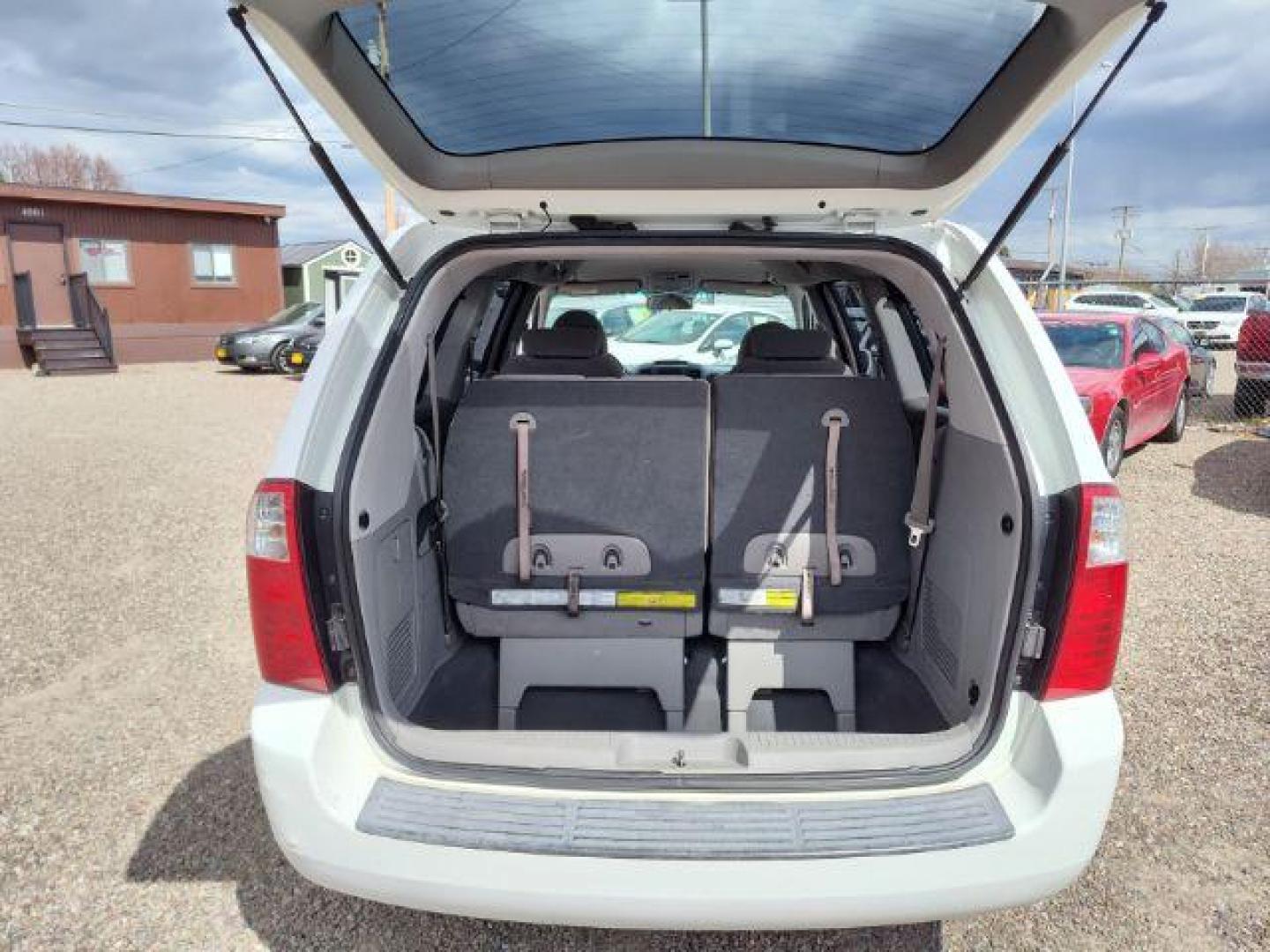 2008 Clear White Kia Sedona LX LWB (KNDMB233686) with an 3.8L V6 DOHC 24V engine, 5-Speed Automatic transmission, located at 4801 10th Ave S,, Great Falls, MT, 59405, 47.494347, -111.229942 - Photo#12