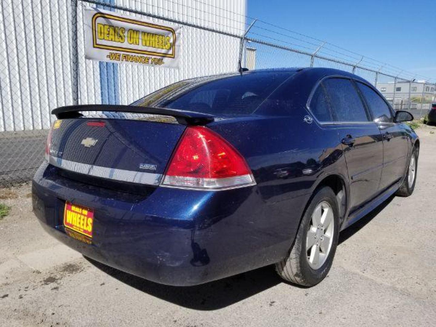 2009 Imperial Blue Metallic Chevrolet Impala LT (2G1WT57KX91) with an 3.5L V6 OHV 12V FFV engine, 4-Speed Automatic transmission, located at 1800 West Broadway, Missoula, 59808, (406) 543-1986, 46.881348, -114.023628 - Photo#4