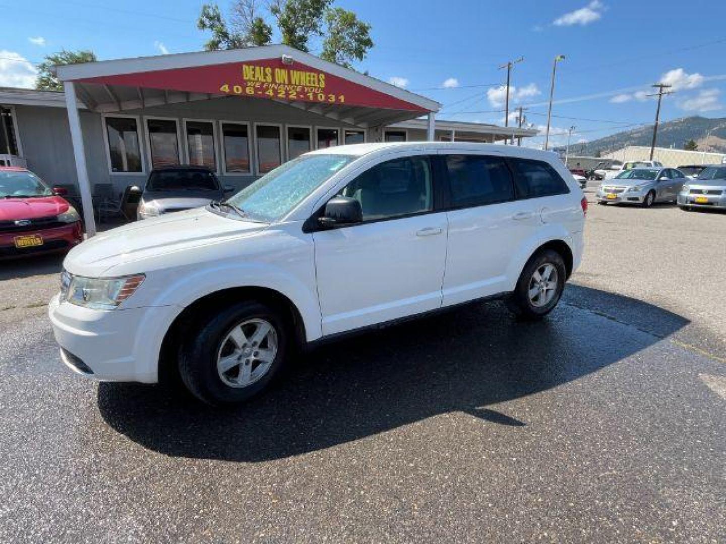 2009 Dodge Journey SE (3D4GG47B19T) with an 2.4L L4 DOHC 16V engine, 4-Speed Automatic transmission, located at 1821 N Montana Ave., Helena, MT, 59601, 46.603447, -112.022781 - Photo#0