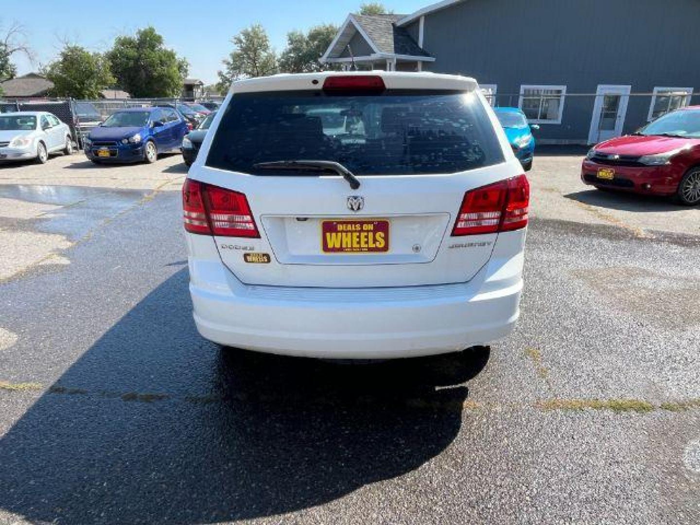 2009 Dodge Journey SE (3D4GG47B19T) with an 2.4L L4 DOHC 16V engine, 4-Speed Automatic transmission, located at 1821 N Montana Ave., Helena, MT, 59601, 46.603447, -112.022781 - Photo#4