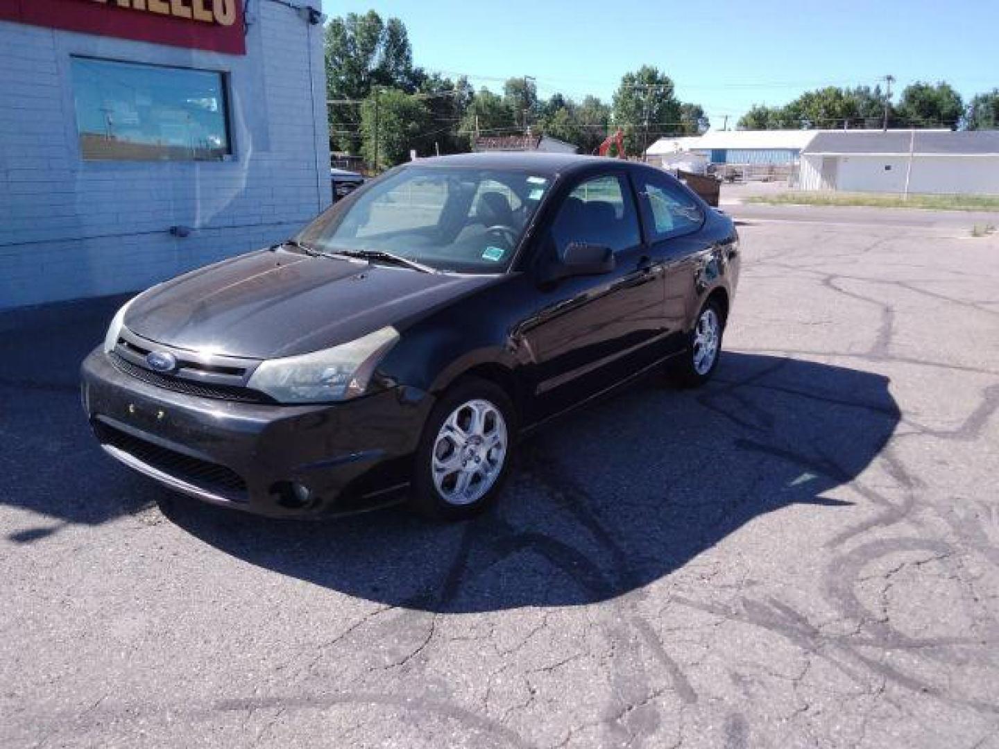 2009 Ford Focus SE Coupe (1FAHP32N69W) with an 2.0L L4 DOHC 16V engine, located at 4801 10th Ave S,, Great Falls, MT, 59405, 47.494347, -111.229942 - Photo#0