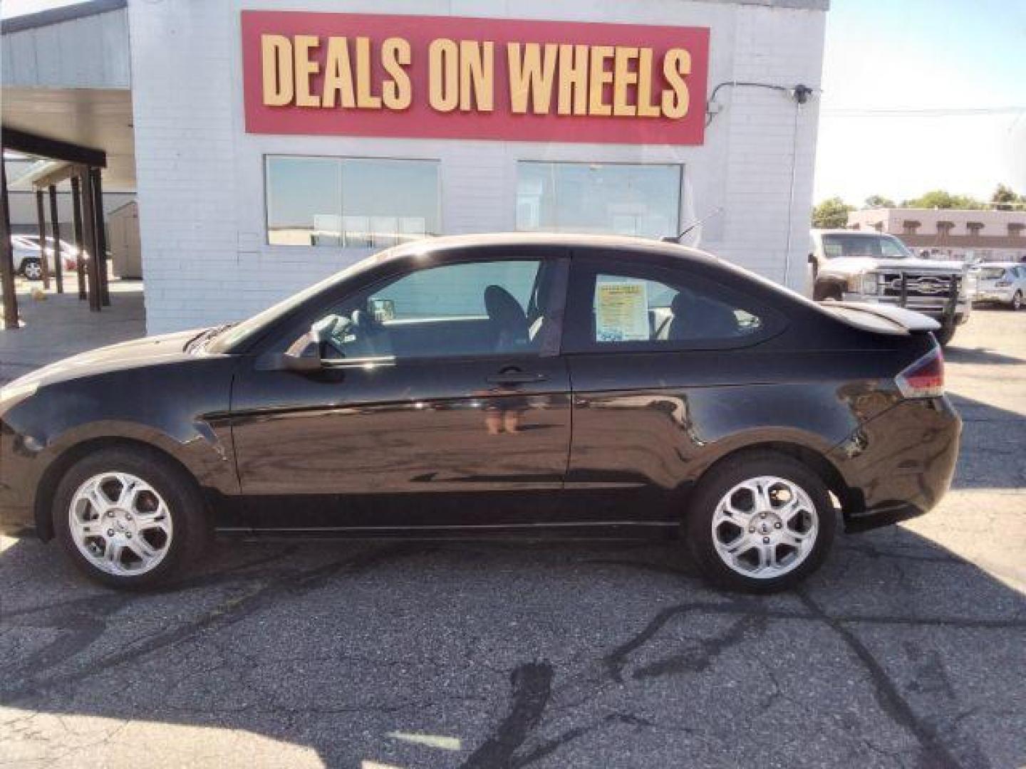 2009 Ford Focus SE Coupe (1FAHP32N69W) with an 2.0L L4 DOHC 16V engine, located at 4801 10th Ave S,, Great Falls, MT, 59405, 47.494347, -111.229942 - Photo#1