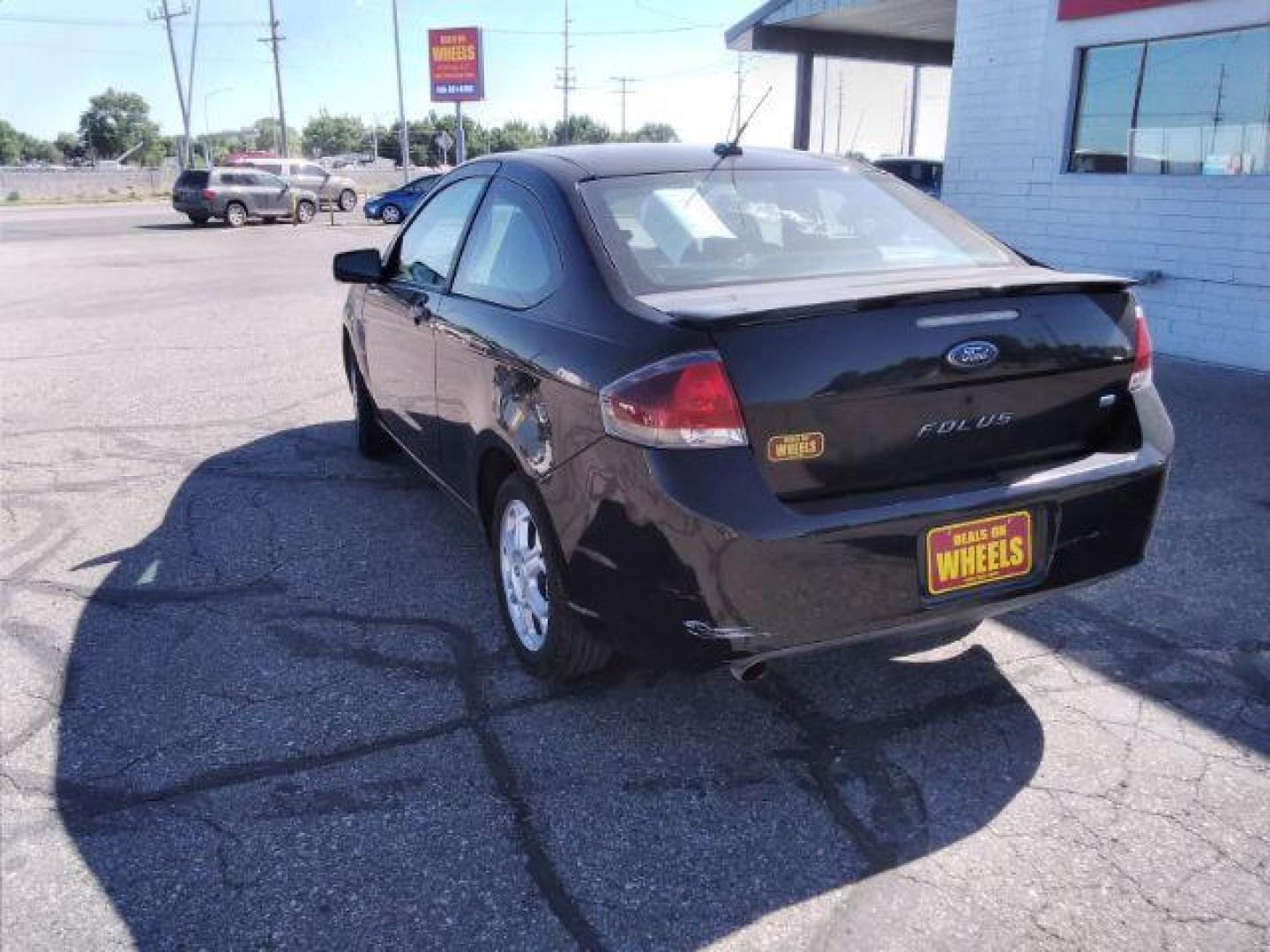 2009 Ford Focus SE Coupe (1FAHP32N69W) with an 2.0L L4 DOHC 16V engine, located at 4801 10th Ave S,, Great Falls, MT, 59405, 47.494347, -111.229942 - Photo#2