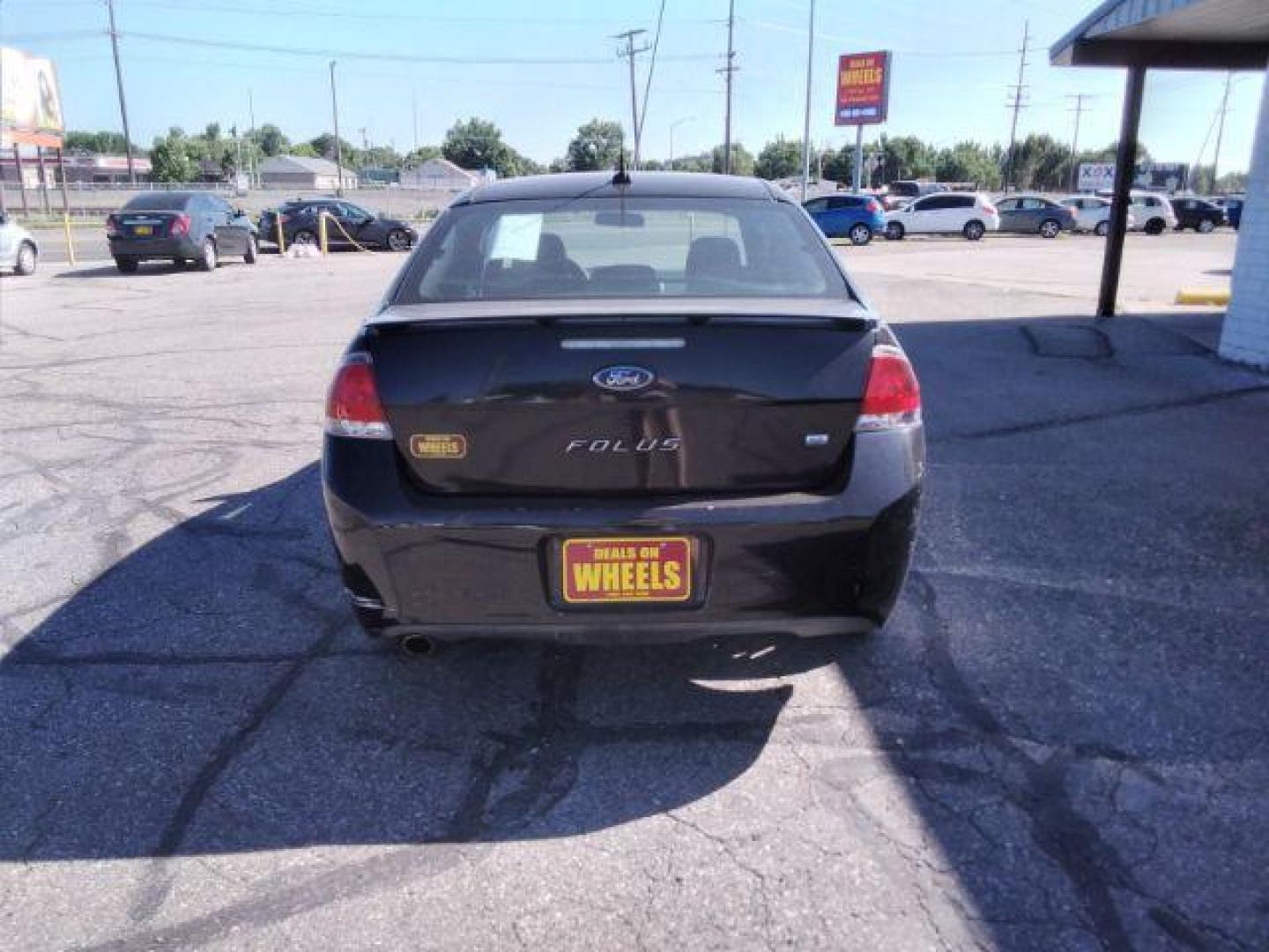 2009 Ford Focus SE Coupe (1FAHP32N69W) with an 2.0L L4 DOHC 16V engine, located at 4801 10th Ave S,, Great Falls, MT, 59405, 47.494347, -111.229942 - Photo#3