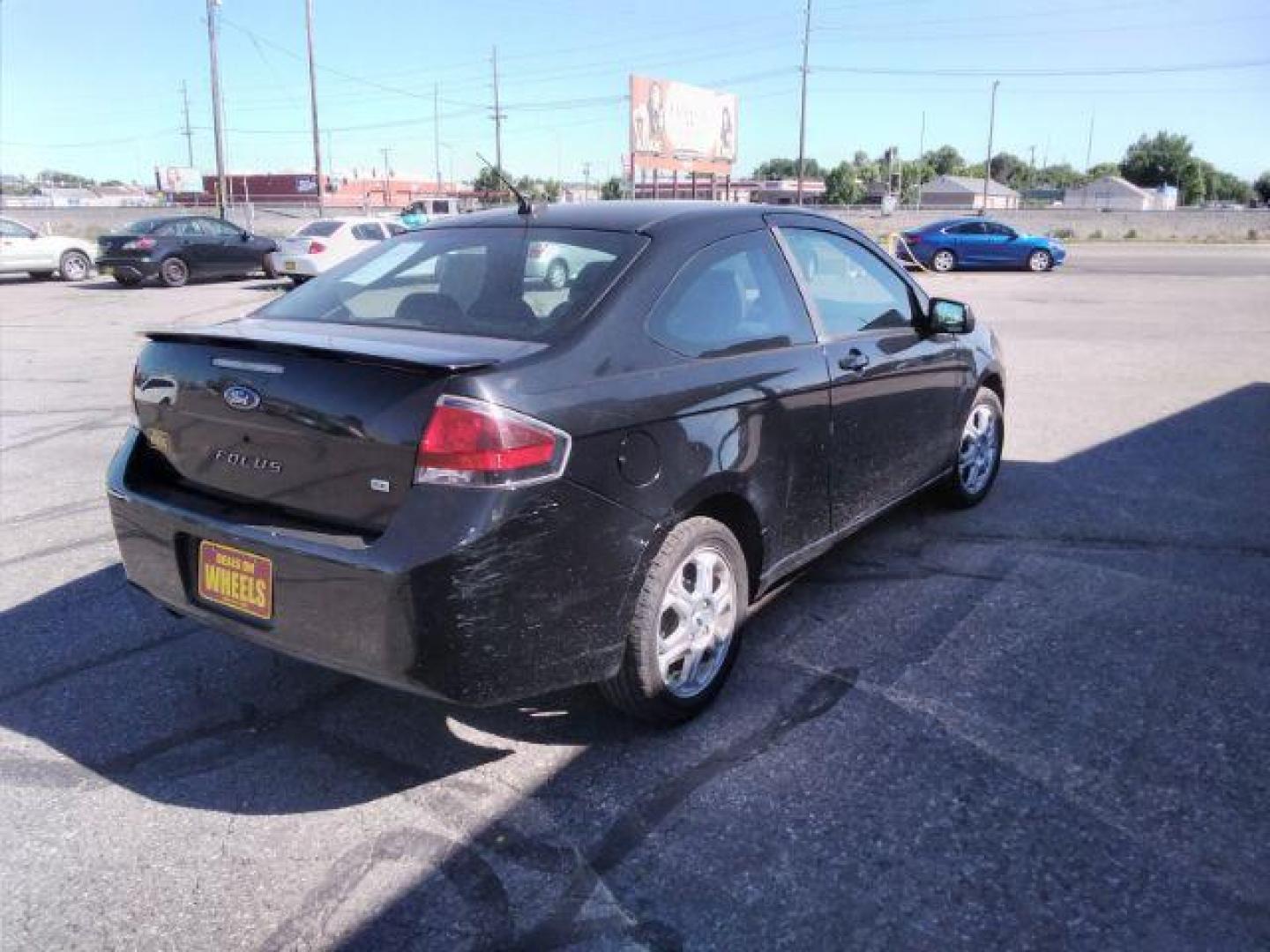 2009 Ford Focus SE Coupe (1FAHP32N69W) with an 2.0L L4 DOHC 16V engine, located at 4801 10th Ave S,, Great Falls, MT, 59405, 47.494347, -111.229942 - Photo#4