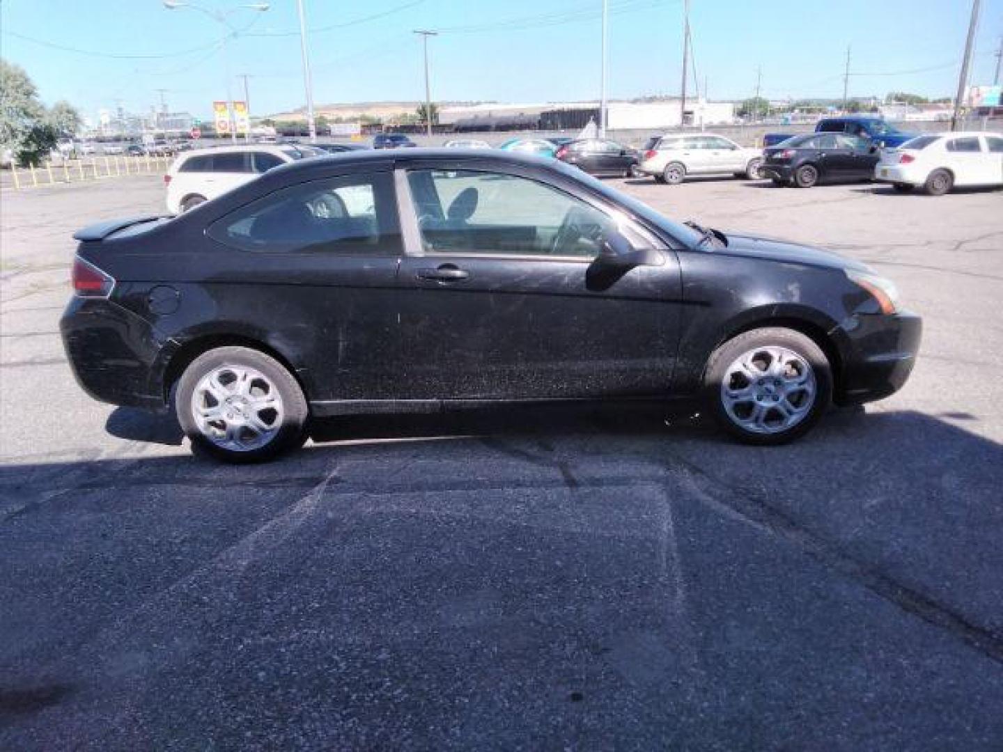 2009 Ford Focus SE Coupe (1FAHP32N69W) with an 2.0L L4 DOHC 16V engine, located at 4801 10th Ave S,, Great Falls, MT, 59405, 47.494347, -111.229942 - Photo#5