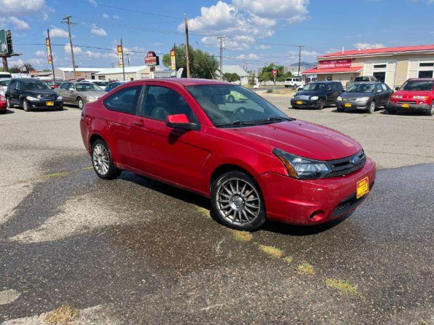 2009 Ford Focus SES Coupe (1FAHP33NX9W) with an 2.0L L4 DOHC 16V engine, located at 1821 N Montana Ave., Helena, MT, 59601, 46.603447, -112.022781 - Photo#2