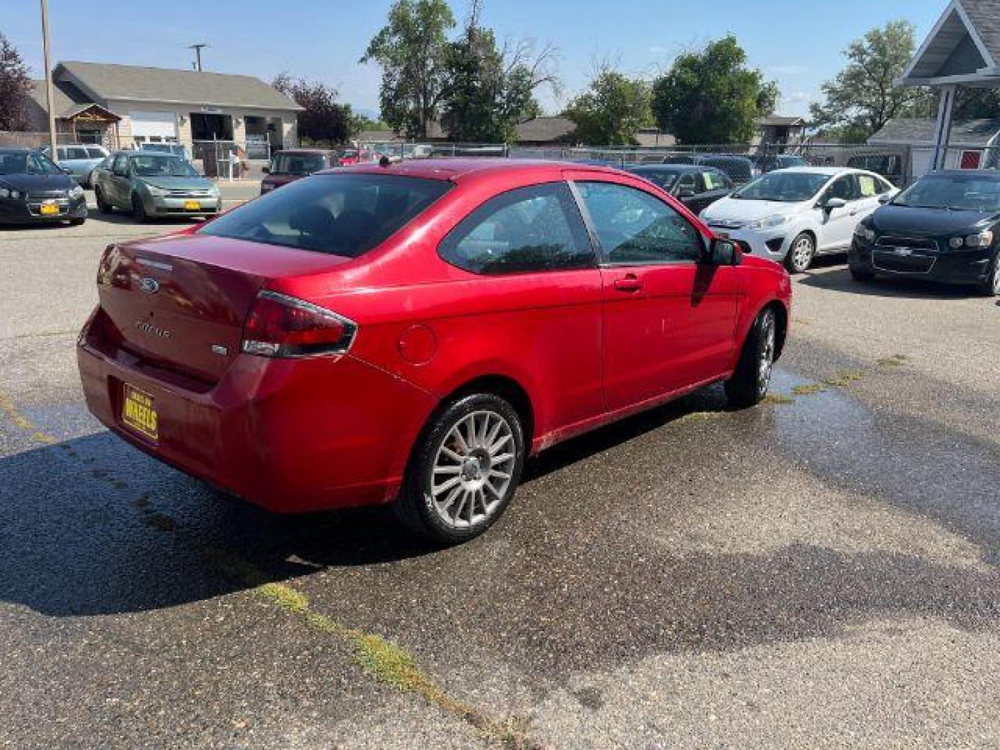 2009 Ford Focus SES Coupe (1FAHP33NX9W) with an 2.0L L4 DOHC 16V engine, located at 1821 N Montana Ave., Helena, MT, 59601, 46.603447, -112.022781 - Photo#4