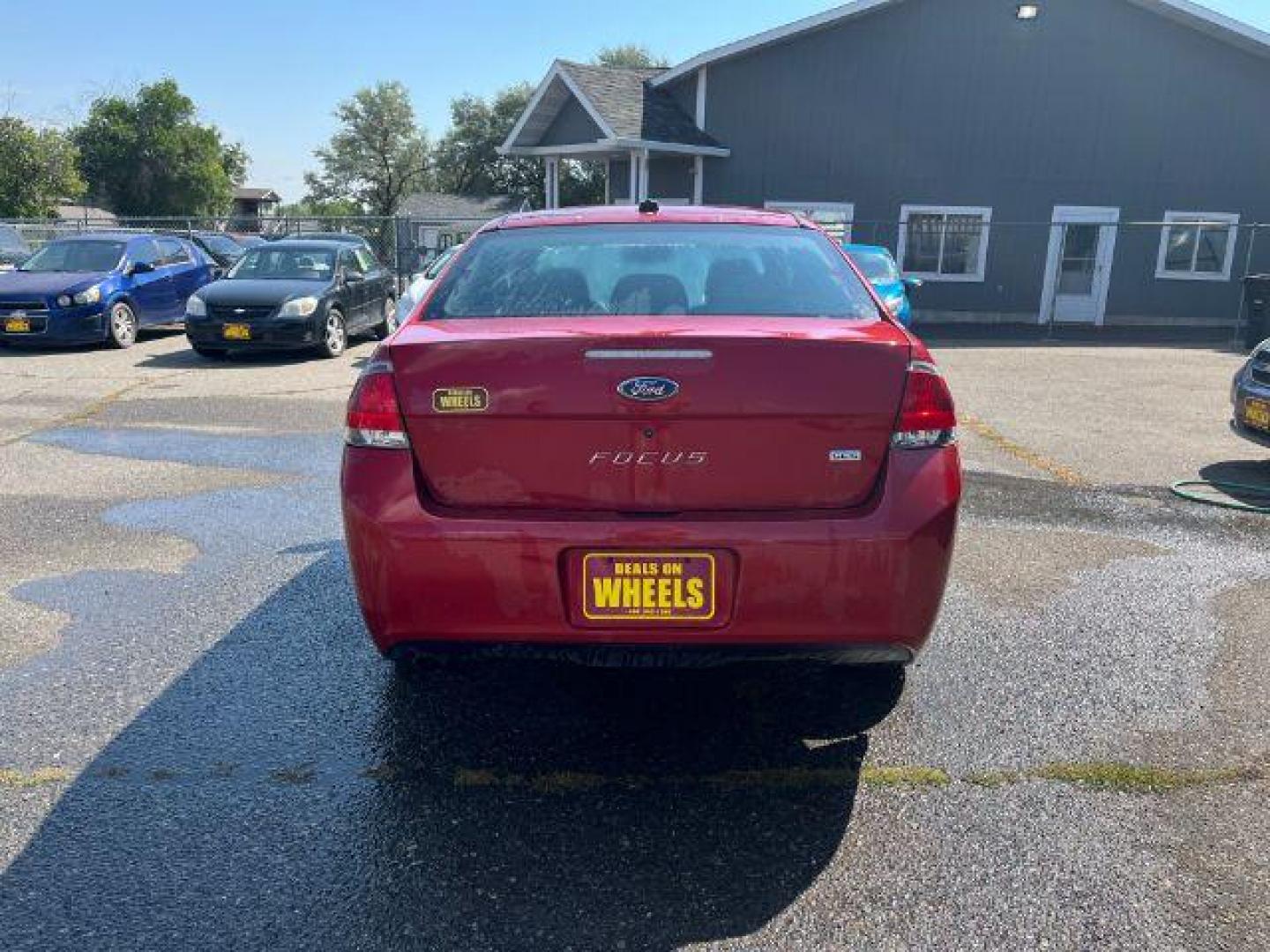 2009 Ford Focus SES Coupe (1FAHP33NX9W) with an 2.0L L4 DOHC 16V engine, located at 1821 N Montana Ave., Helena, MT, 59601, 46.603447, -112.022781 - Photo#5