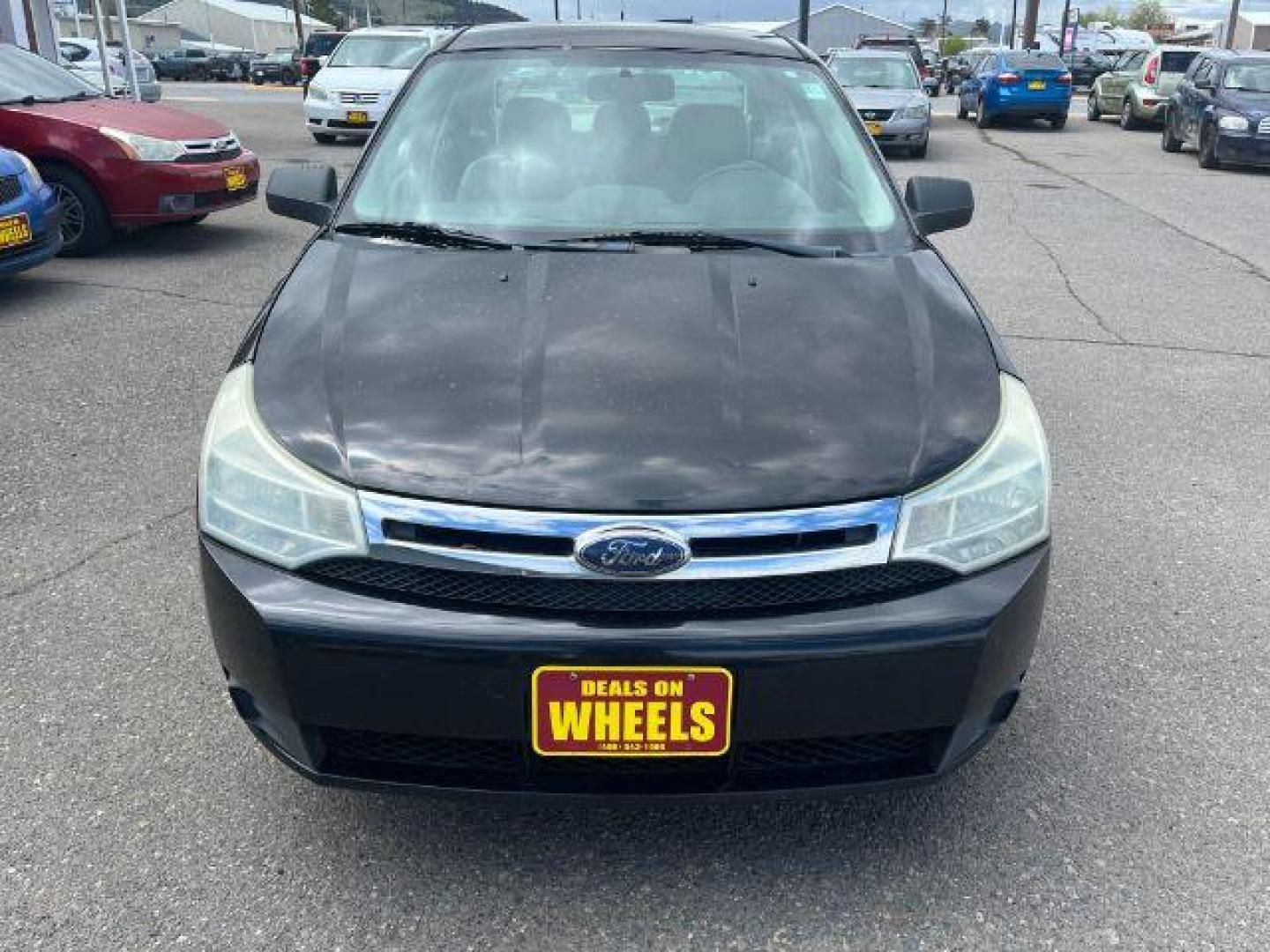 2009 Ford Focus SE Sedan (1FAHP35N99W) with an 2.0L L4 DOHC 16V engine, located at 1821 N Montana Ave., Helena, MT, 59601, 46.603447, -112.022781 - Photo#1