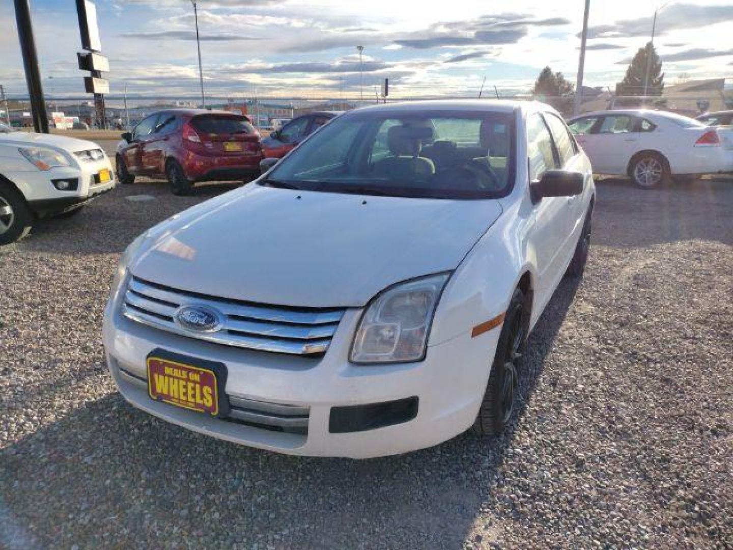 2009 Ford Fusion I4 S (3FAHP06Z19R) with an 2.3L L4 DOHC 16V engine, located at 4801 10th Ave S,, Great Falls, MT, 59405, 47.494347, -111.229942 - Photo#0