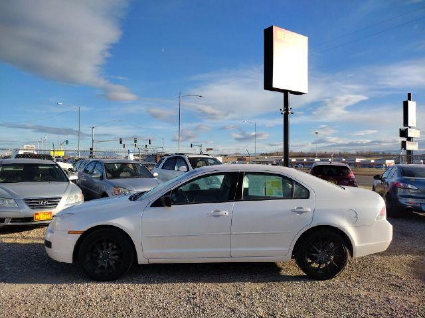 2009 Ford Fusion I4 S (3FAHP06Z19R) with an 2.3L L4 DOHC 16V engine, located at 4801 10th Ave S,, Great Falls, MT, 59405, 47.494347, -111.229942 - Photo#1