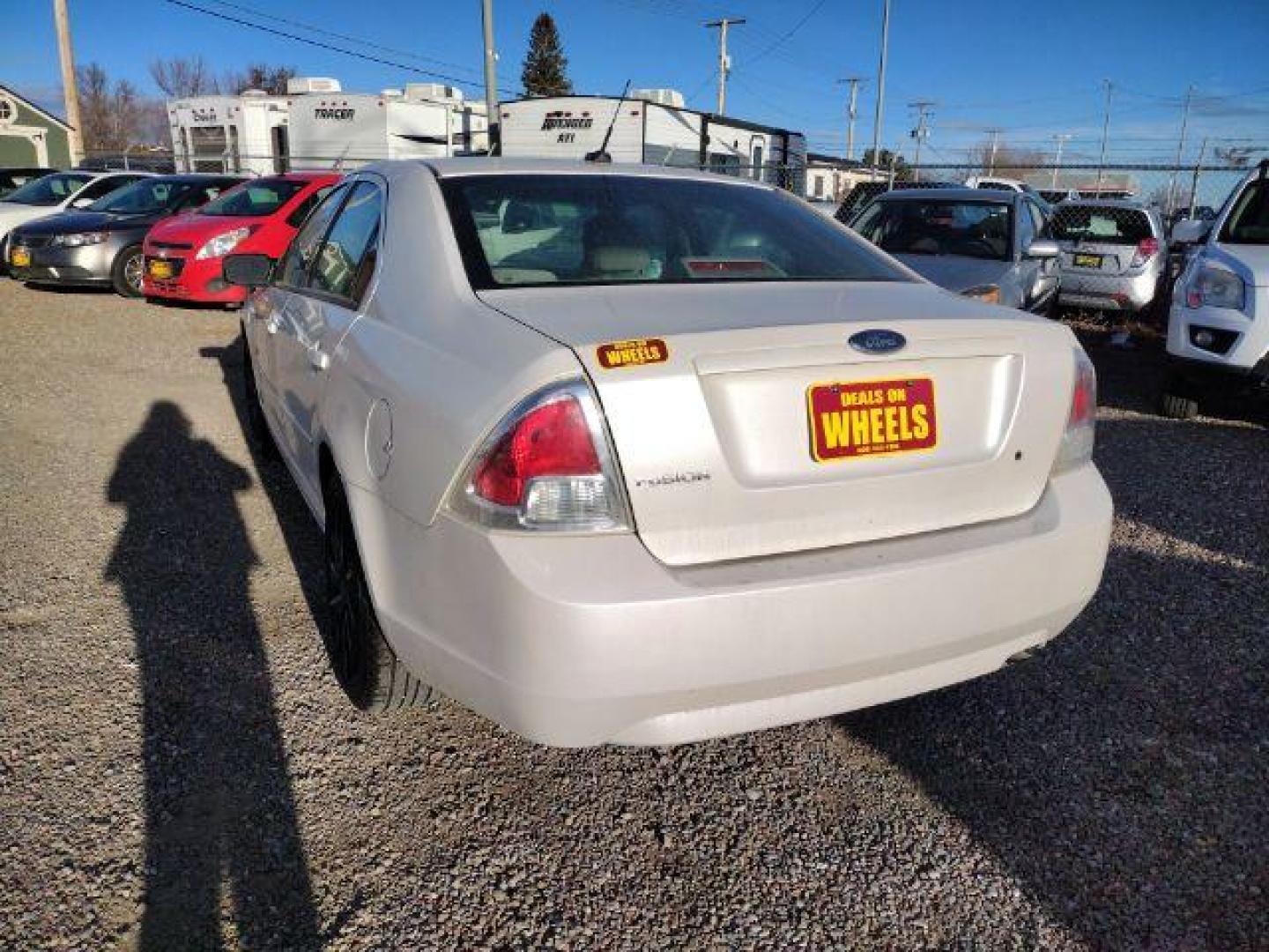 2009 Ford Fusion I4 S (3FAHP06Z19R) with an 2.3L L4 DOHC 16V engine, located at 4801 10th Ave S,, Great Falls, MT, 59405, 47.494347, -111.229942 - Photo#2