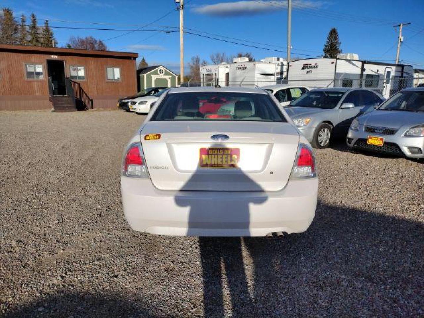 2009 Ford Fusion I4 S (3FAHP06Z19R) with an 2.3L L4 DOHC 16V engine, located at 4801 10th Ave S,, Great Falls, MT, 59405, 47.494347, -111.229942 - Photo#3