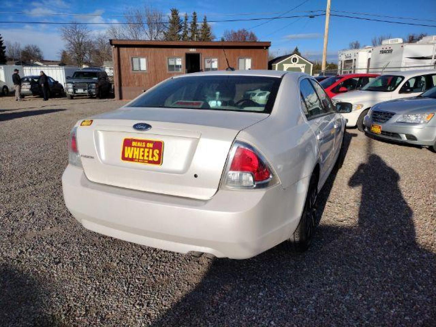 2009 Ford Fusion I4 S (3FAHP06Z19R) with an 2.3L L4 DOHC 16V engine, located at 4801 10th Ave S,, Great Falls, MT, 59405, 47.494347, -111.229942 - Photo#4