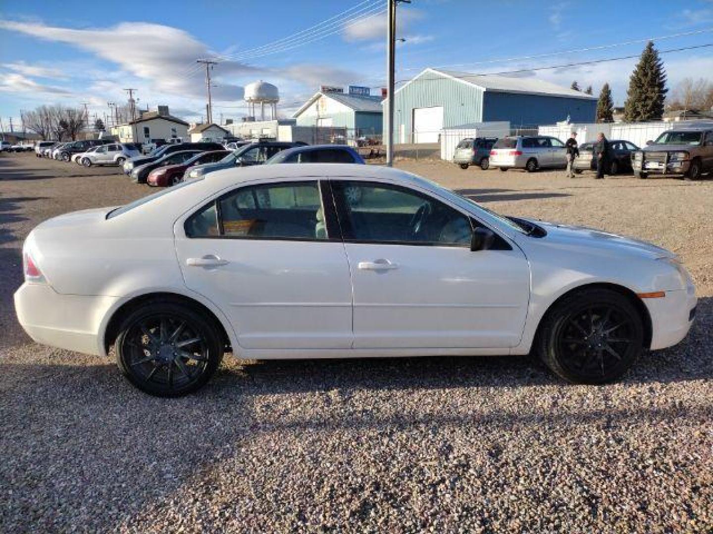 2009 Ford Fusion I4 S (3FAHP06Z19R) with an 2.3L L4 DOHC 16V engine, located at 4801 10th Ave S,, Great Falls, MT, 59405, 47.494347, -111.229942 - Photo#5