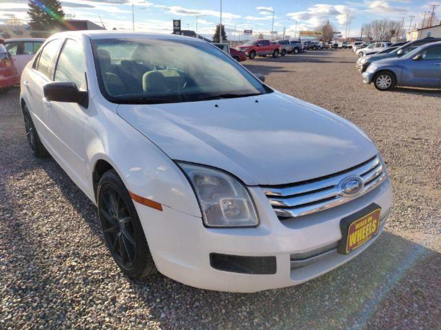 2009 Ford Fusion I4 S (3FAHP06Z19R) with an 2.3L L4 DOHC 16V engine, located at 4801 10th Ave S,, Great Falls, MT, 59405, 47.494347, -111.229942 - Photo#6