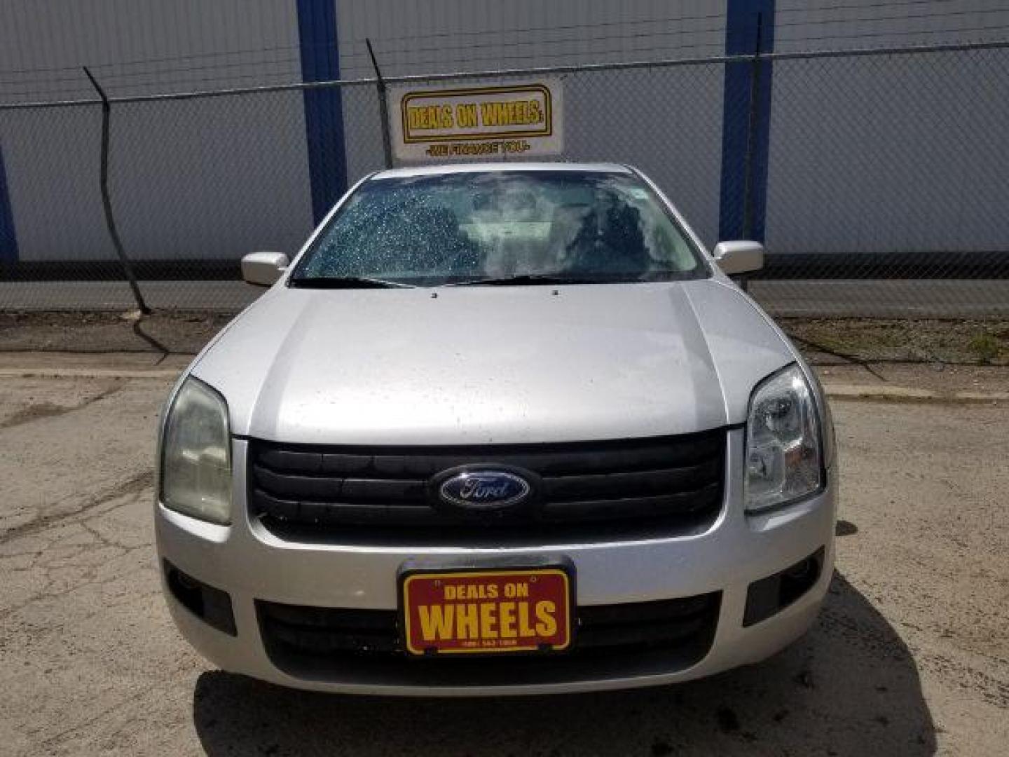 2009 Ford Fusion I4 SE (3FAHP07Z19R) with an 2.3L L4 DOHC 16V engine, located at 4801 10th Ave S,, Great Falls, MT, 59405, 47.494347, -111.229942 - Photo#1