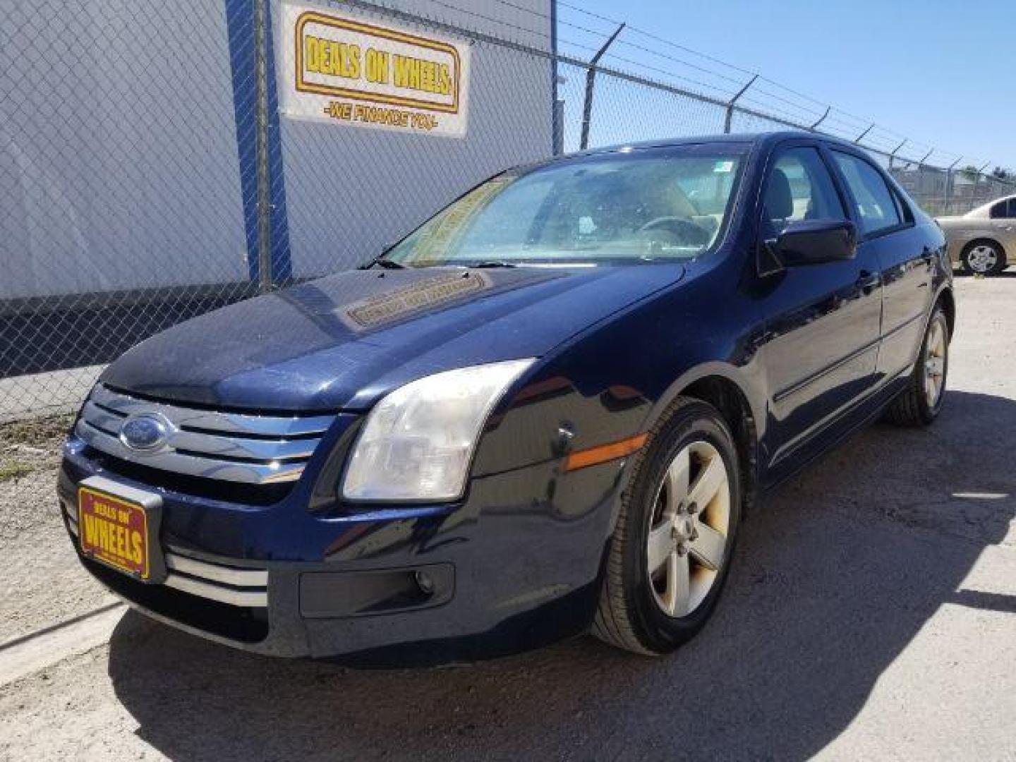 2009 Ford Fusion I4 SE (3FAHP07Z89R) with an 2.3L L4 DOHC 16V engine, located at 4801 10th Ave S,, Great Falls, MT, 59405, 47.494347, -111.229942 - Photo#0