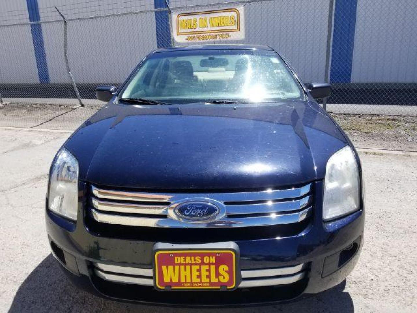 2009 Ford Fusion I4 SE (3FAHP07Z89R) with an 2.3L L4 DOHC 16V engine, located at 4801 10th Ave S,, Great Falls, MT, 59405, 47.494347, -111.229942 - Photo#1