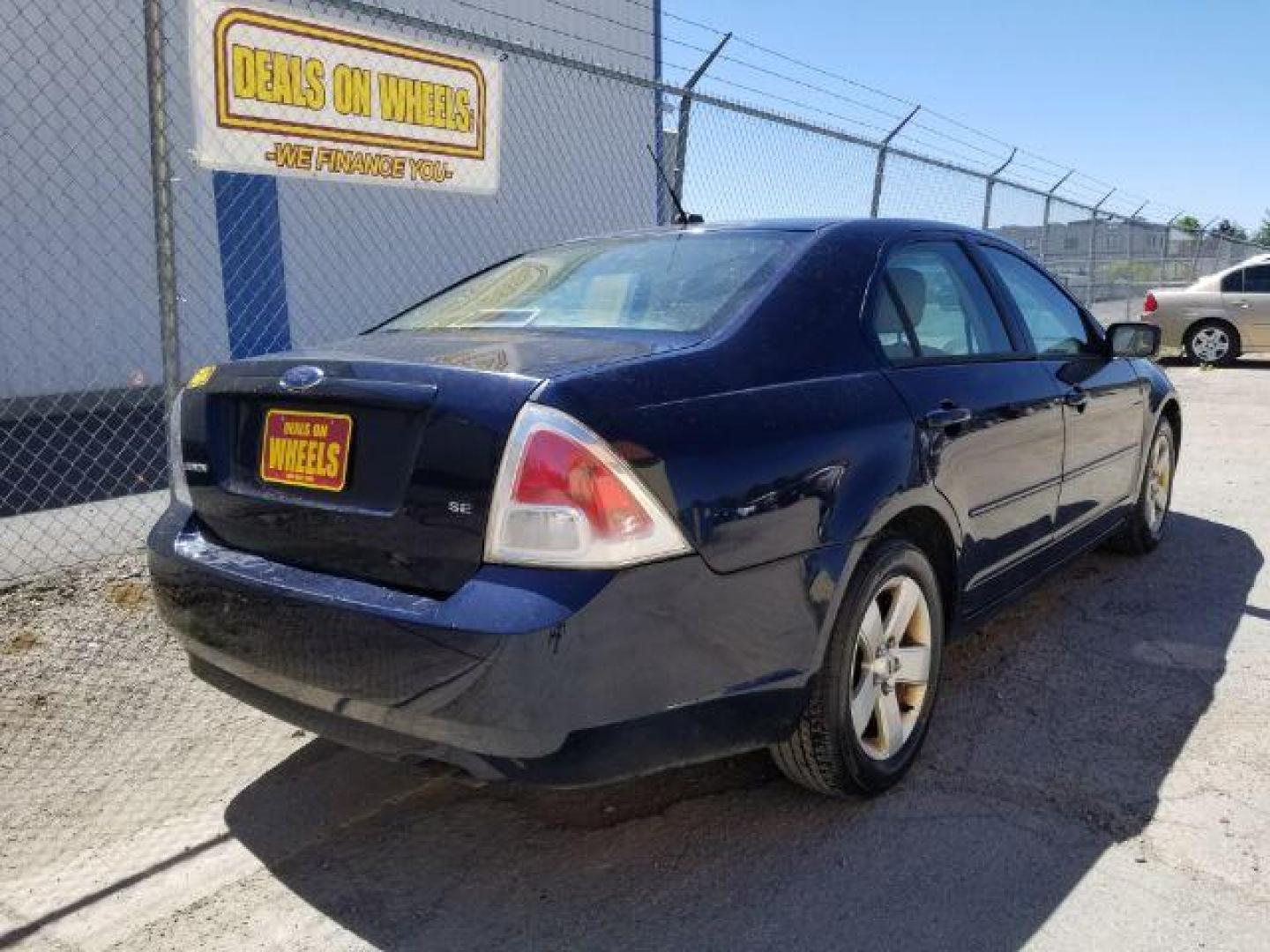 2009 Ford Fusion I4 SE (3FAHP07Z89R) with an 2.3L L4 DOHC 16V engine, located at 4801 10th Ave S,, Great Falls, MT, 59405, 47.494347, -111.229942 - Photo#4