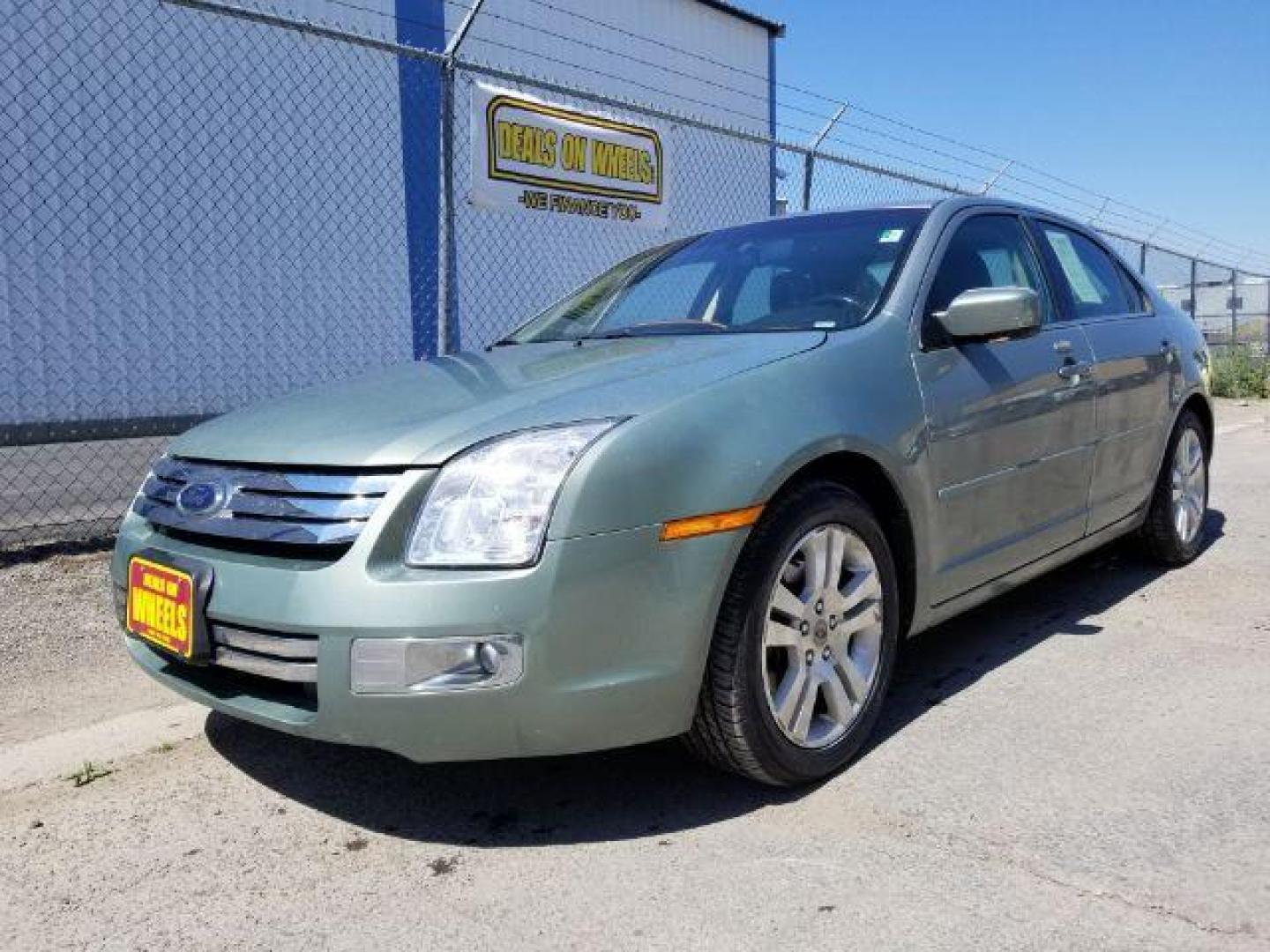 2009 Ford Fusion V6 SEL AWD (3FAHP02119R) with an 3.0L V6 DOHC 24V engine, located at 601 E. Idaho St., Kalispell, MT, 59901, 48.203983, -114.308662 - Photo#0