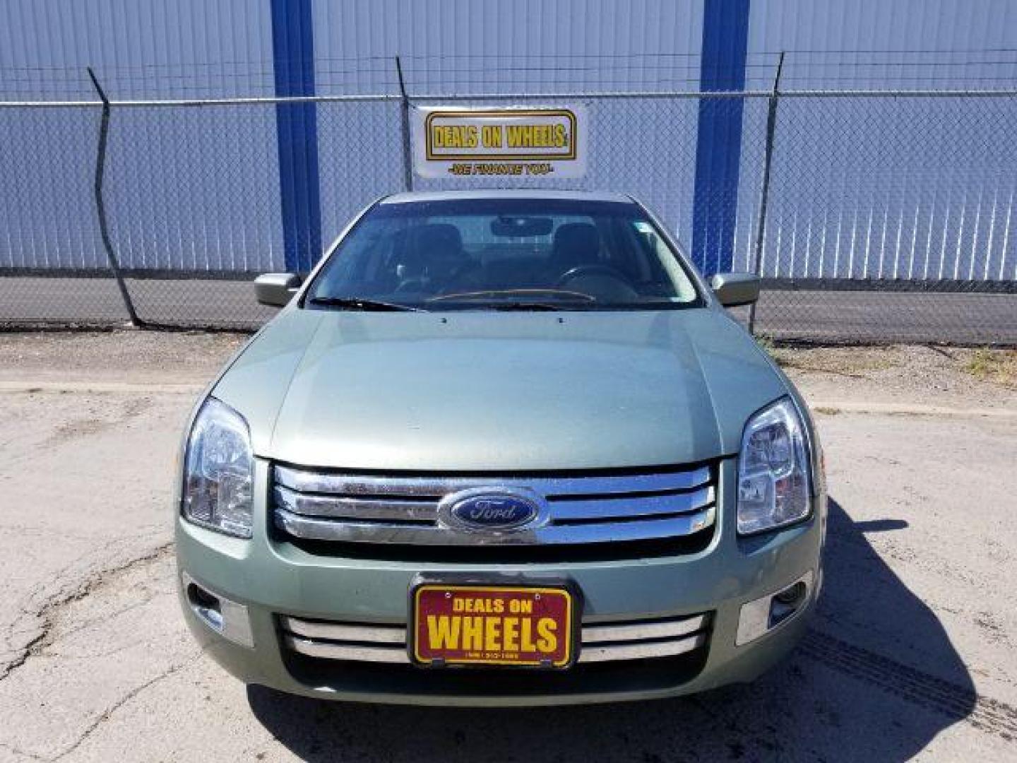 2009 Ford Fusion V6 SEL AWD (3FAHP02119R) with an 3.0L V6 DOHC 24V engine, located at 601 E. Idaho St., Kalispell, MT, 59901, 48.203983, -114.308662 - Photo#1