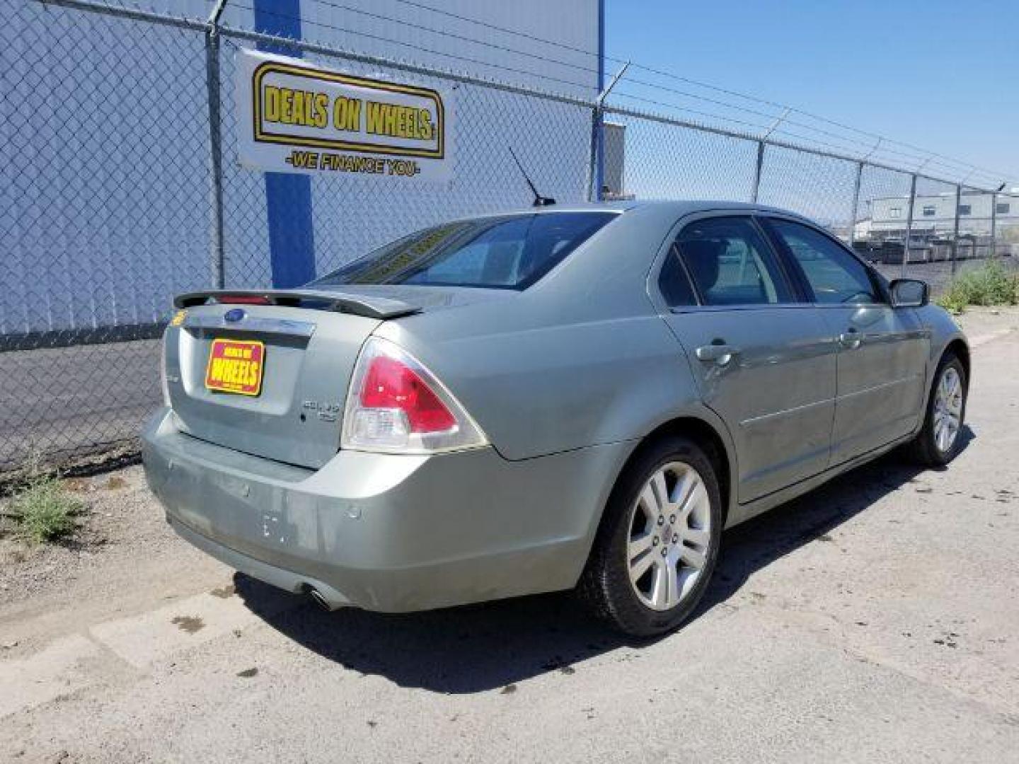 2009 Ford Fusion V6 SEL AWD (3FAHP02119R) with an 3.0L V6 DOHC 24V engine, located at 601 E. Idaho St., Kalispell, MT, 59901, 48.203983, -114.308662 - Photo#4