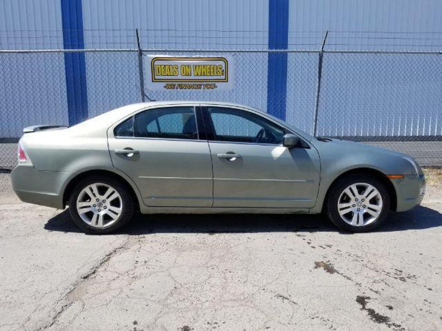 2009 Ford Fusion V6 SEL AWD (3FAHP02119R) with an 3.0L V6 DOHC 24V engine, located at 601 E. Idaho St., Kalispell, MT, 59901, 48.203983, -114.308662 - Photo#5