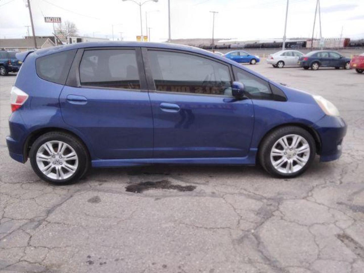 2009 Honda Fit Sport 5-Speed MT (JHMGE87409S) with an 1.5L L4 SOHC 16V engine, 5-Speed Manual transmission, located at 4047 Montana Ave., Billings, MT, 59101, 45.770847, -108.529800 - Photo#6