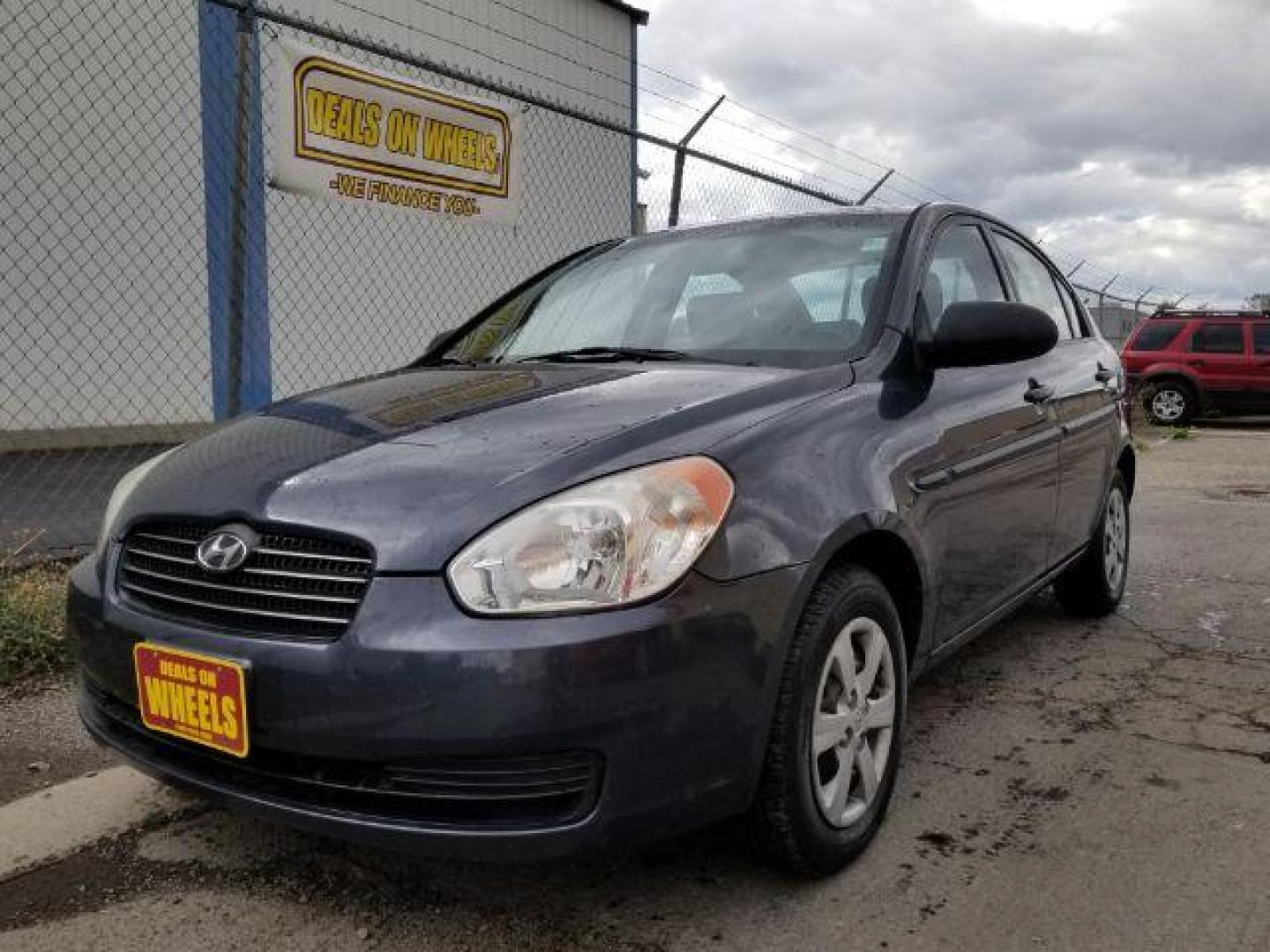 2009 Hyundai Accent GLS 4-Door (KMHCM46C99U) with an 1.6L L4 DOHC 16V engine, located at 601 E. Idaho St., Kalispell, MT, 59901, 48.203983, -114.308662 - Photo#0