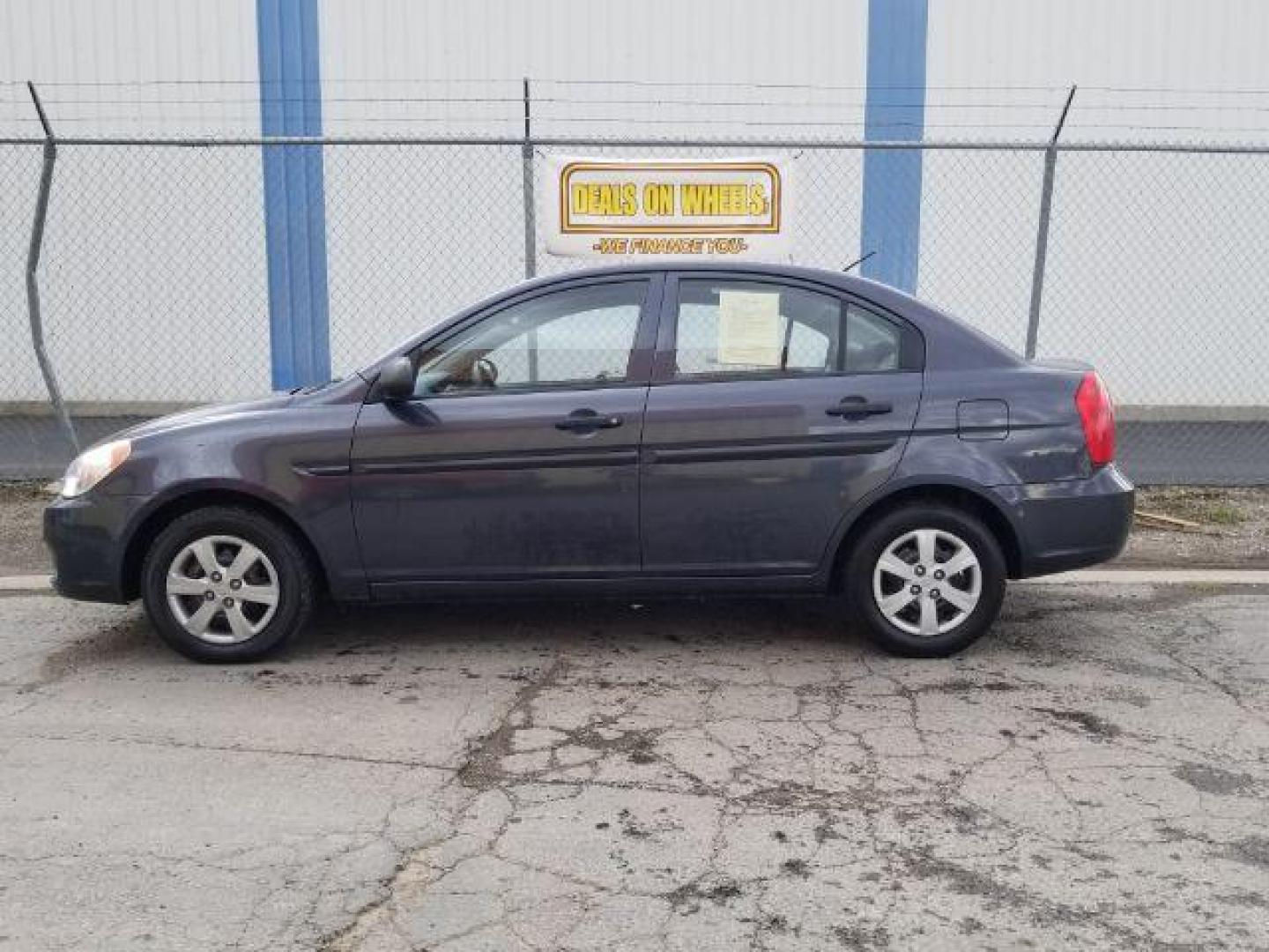 2009 Hyundai Accent GLS 4-Door (KMHCM46C99U) with an 1.6L L4 DOHC 16V engine, located at 601 E. Idaho St., Kalispell, MT, 59901, 48.203983, -114.308662 - Photo#2