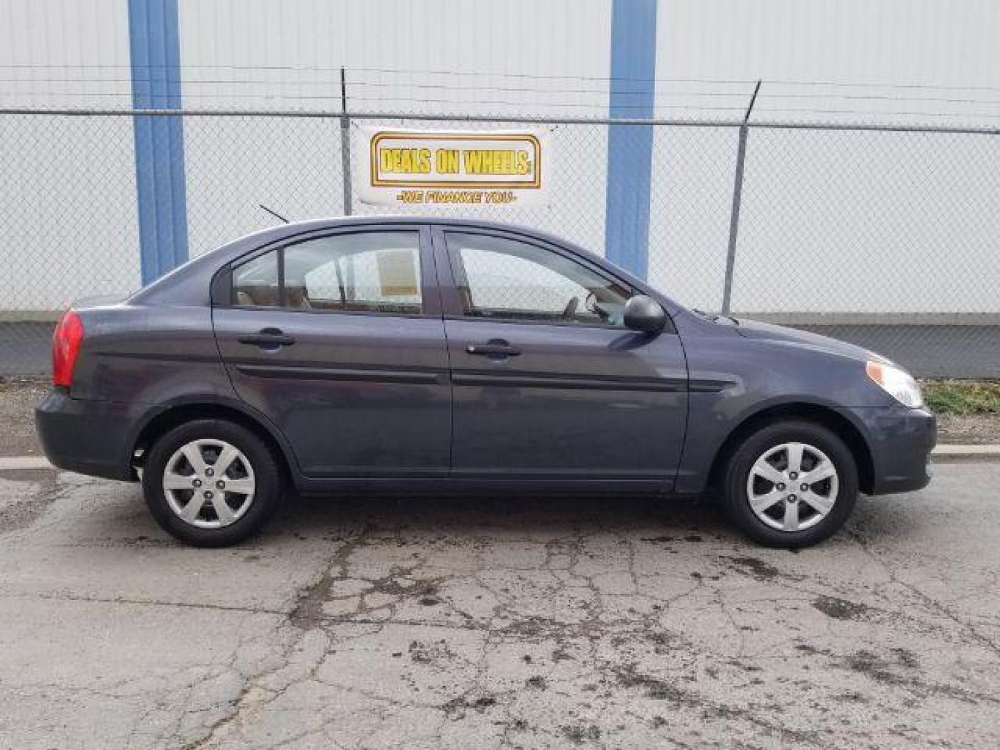 2009 Hyundai Accent GLS 4-Door (KMHCM46C99U) with an 1.6L L4 DOHC 16V engine, located at 601 E. Idaho St., Kalispell, MT, 59901, 48.203983, -114.308662 - Photo#5