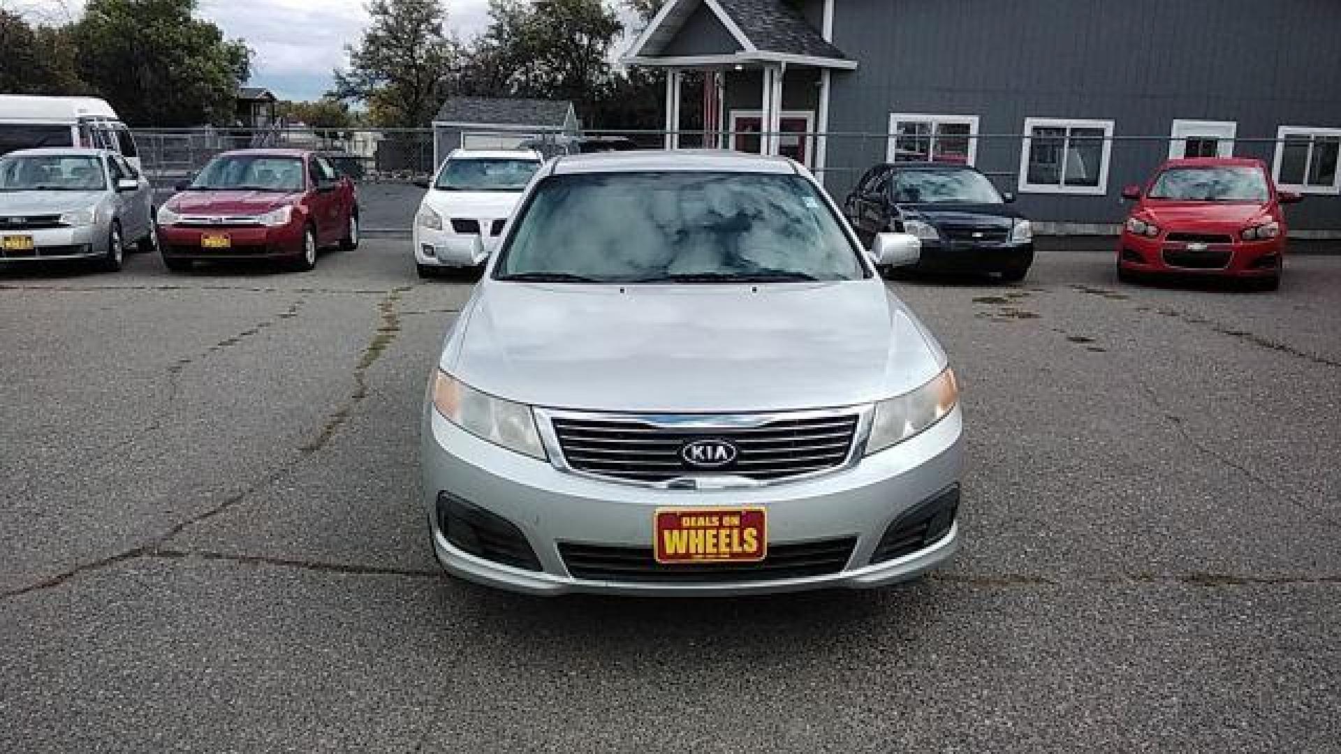 2009 Kia Optima LX (KNAGE228395) with an 2.4L L4 DOHC 16V engine, 4-Speed Automatic transmission, located at 1800 West Broadway, Missoula, 59808, (406) 543-1986, 46.881348, -114.023628 - Looking for a reliable and affordable pre-owned vehicle in Helena, MT? Look no further than this 2009 Kia Optima LX available at DOW - Helena. With a price tag of $13,995, this sedan offers great value for your money. The 2009 Kia Optima LX is powered by a 2.4L L4 DOHC 16V engine, paired with a 4- - Photo#1