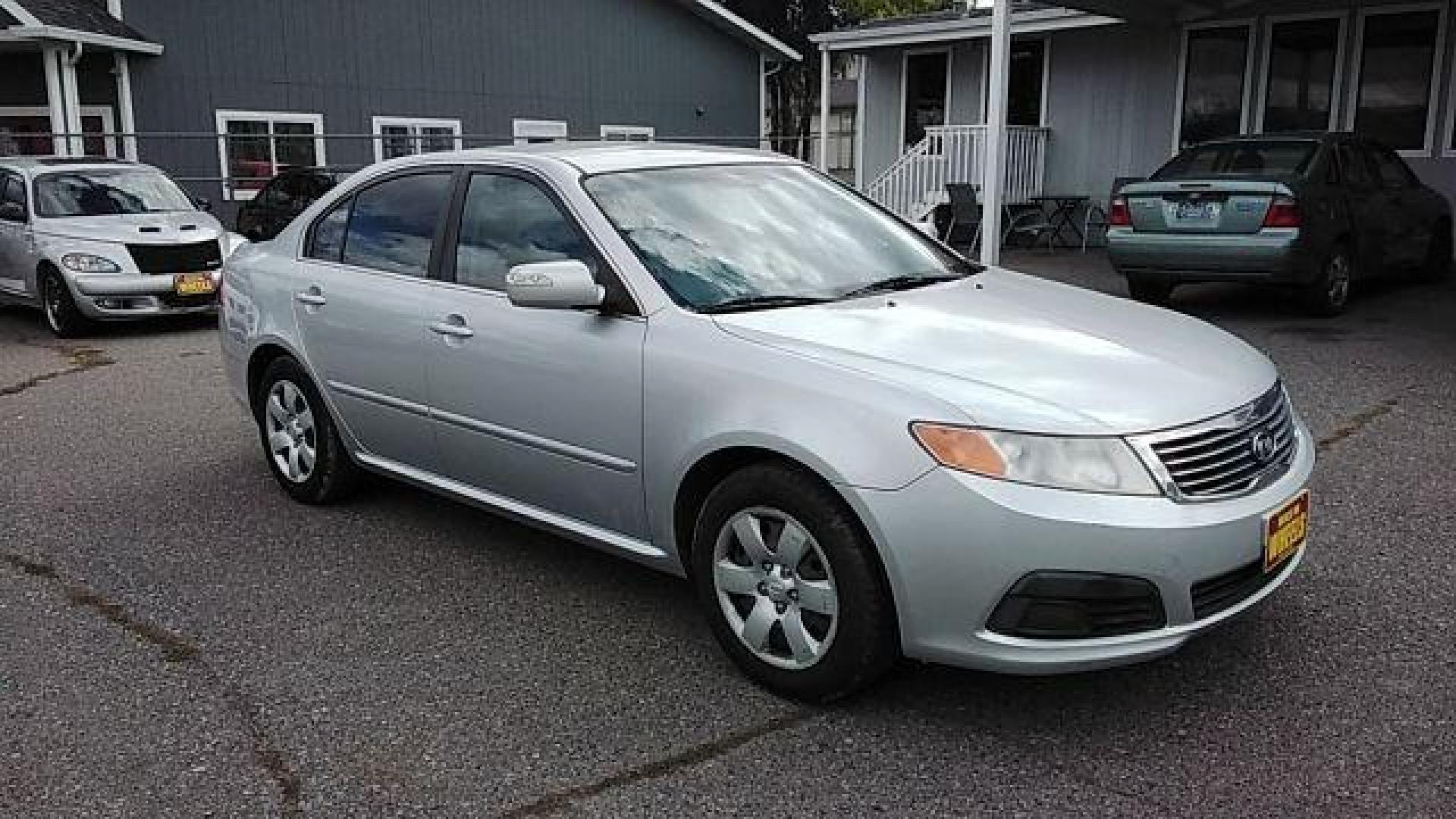 2009 Kia Optima LX (KNAGE228395) with an 2.4L L4 DOHC 16V engine, 4-Speed Automatic transmission, located at 1800 West Broadway, Missoula, 59808, (406) 543-1986, 46.881348, -114.023628 - Looking for a reliable and affordable pre-owned vehicle in Helena, MT? Look no further than this 2009 Kia Optima LX available at DOW - Helena. With a price tag of $13,995, this sedan offers great value for your money. The 2009 Kia Optima LX is powered by a 2.4L L4 DOHC 16V engine, paired with a 4- - Photo#2